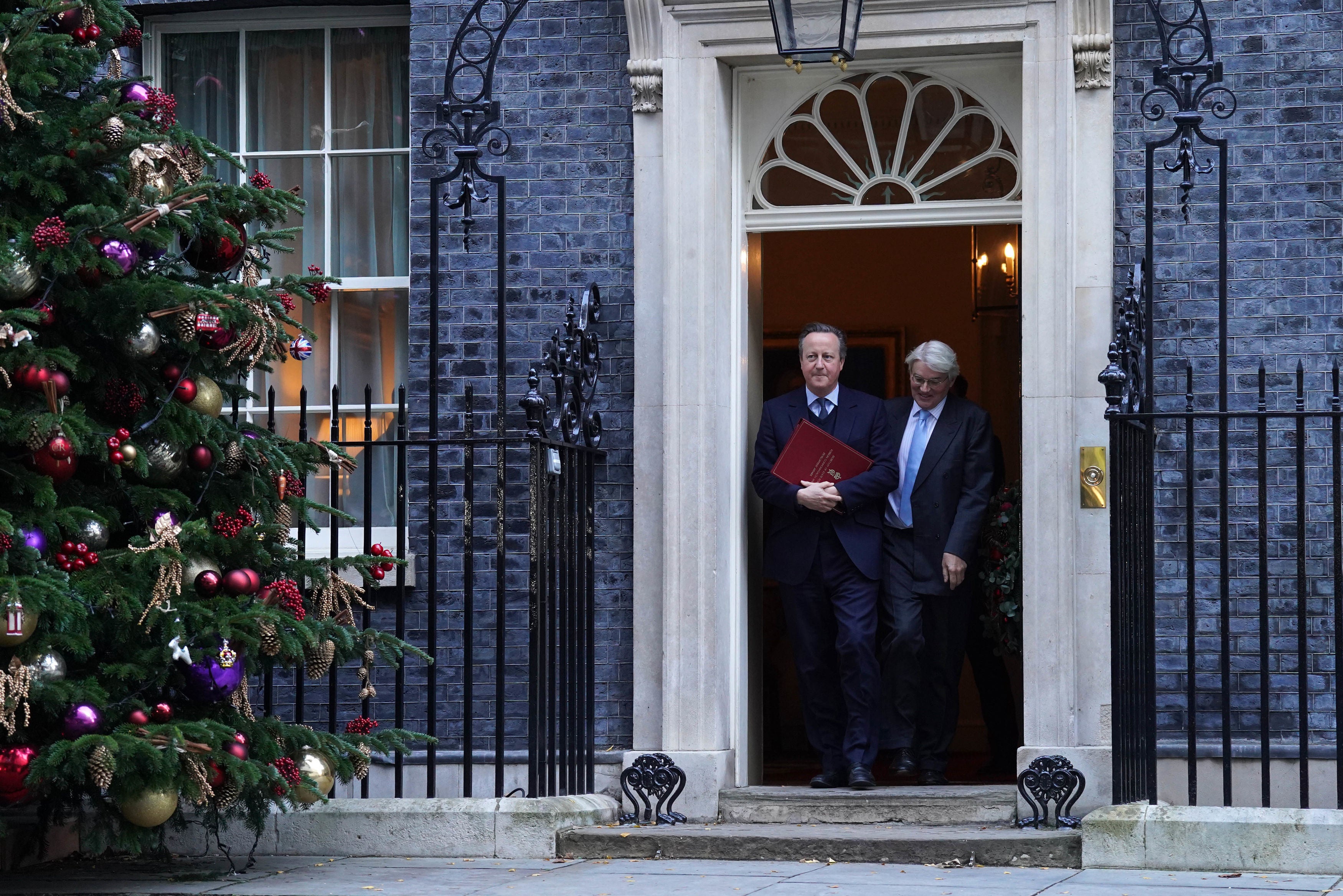 <p>Foreign Secretary Lord David Cameron (left) and Minister of State for Development and Africa Andrew Mitchell leave 10 Downing Street</p>