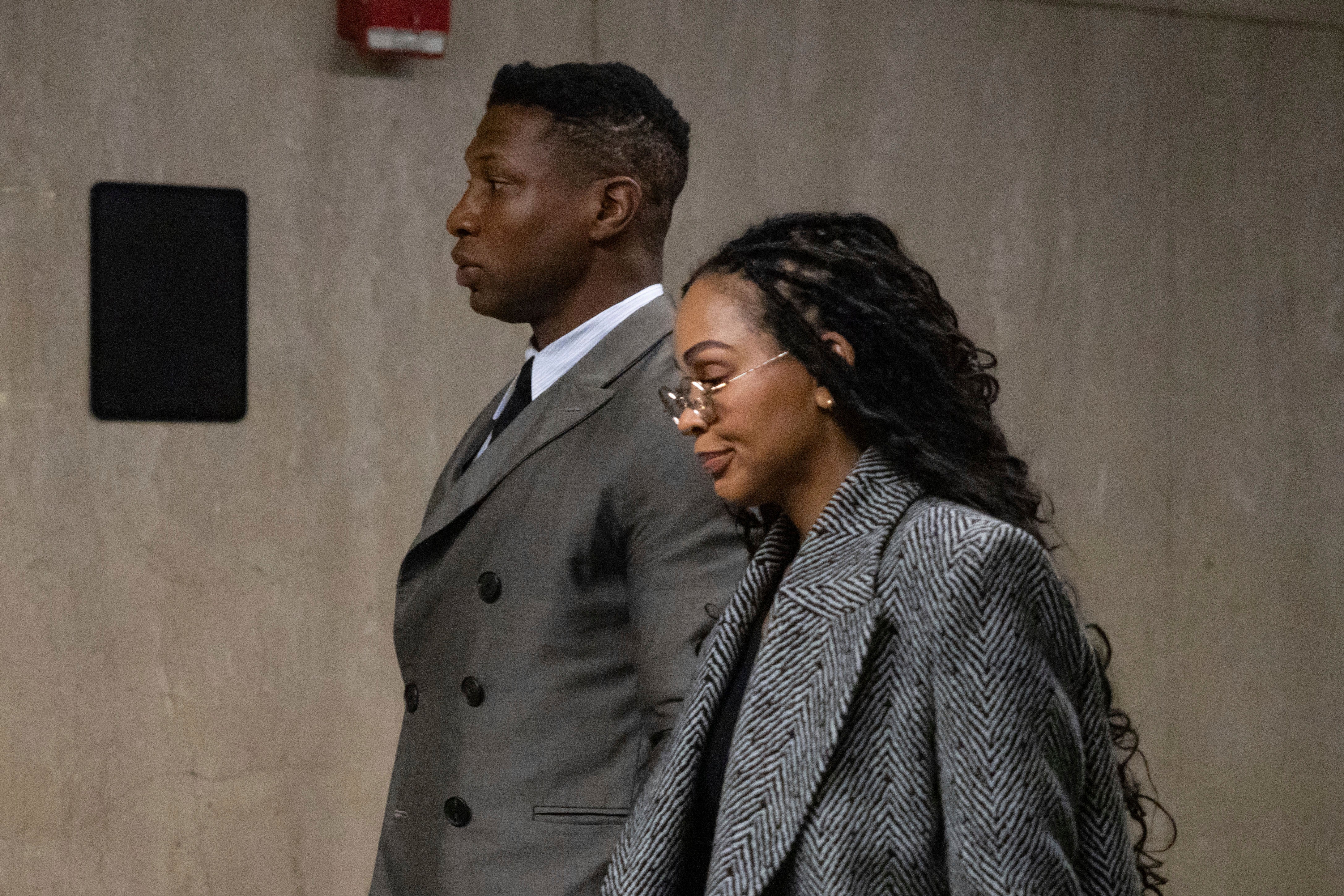 <p>Actor Jonathan Majors and Meagan Good exit a courtroom during a break in jury selection in his domestic violence case, Wednesday, Nov. 29, 2023, in New York. (AP Photo/Yuki Iwamura)</p>