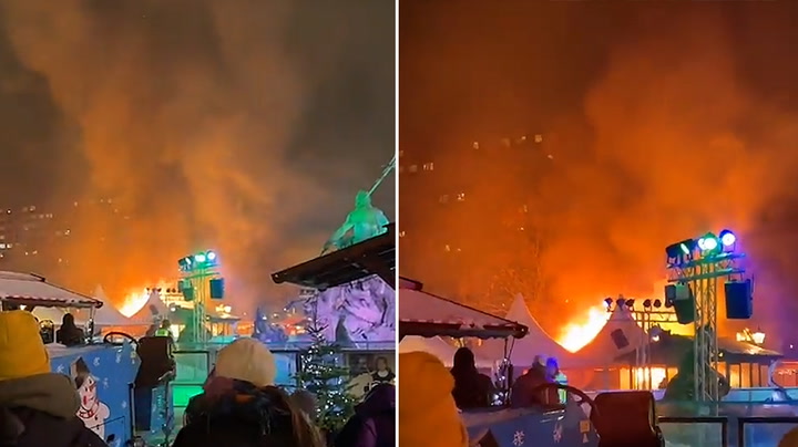 A large blaze tears through the Christmas market in Berlin, causing tourists to evacuate.