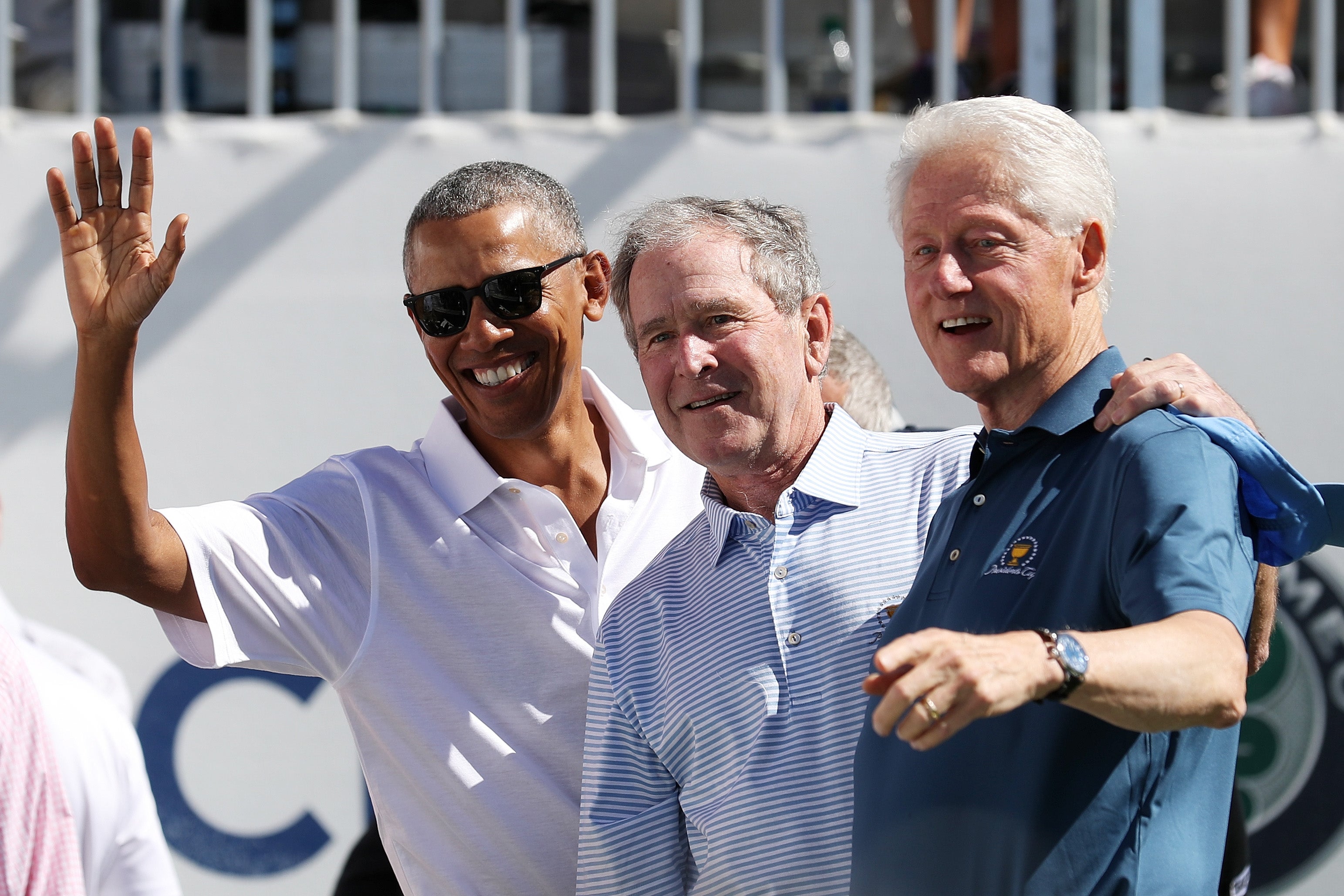 <p>Former U.S. Presidents Barack Obama, George W. Bush and Bill Clinton attend the trophy presentation prior to Thursday foursome matches of the Presidents Cup at Liberty National Golf Club on September 28, 2017 in Jersey City, New Jersey</p>