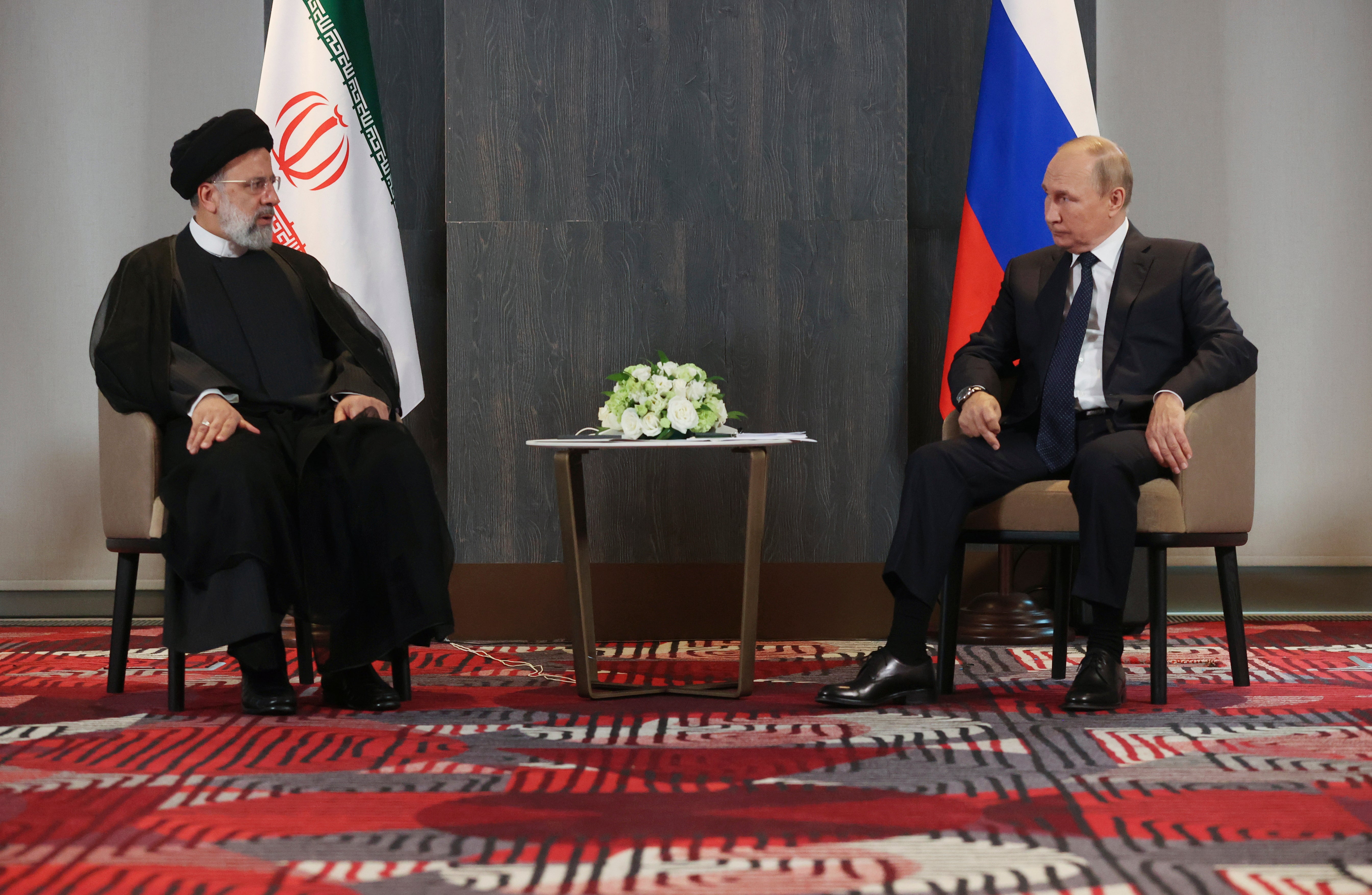 <p>Vladimir Putin meets with Iranian President Ebrahim Raisi on the sidelines of the Shanghai Cooperation Organisation (SCO) summit in September  </p>