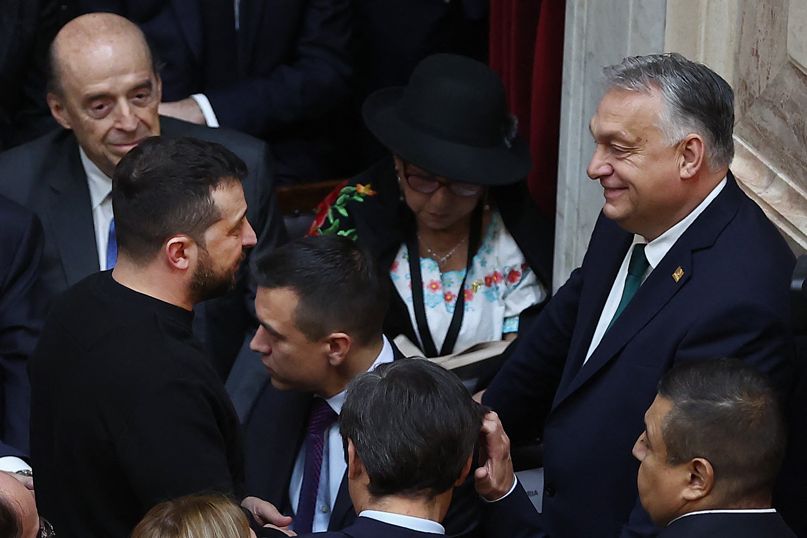 <p>Ukraine's President Volodymyr Zelensky chats with Hungary's Prime Minister Viktor Orban during the inauguration of Argentina's new president Javier Milei</p>