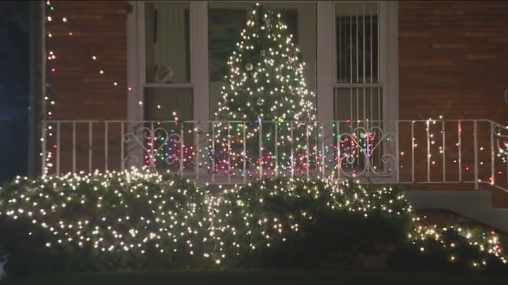 The Chicago community has adorned 500 homes across an eight-mile stretch with festive Christmas lights.