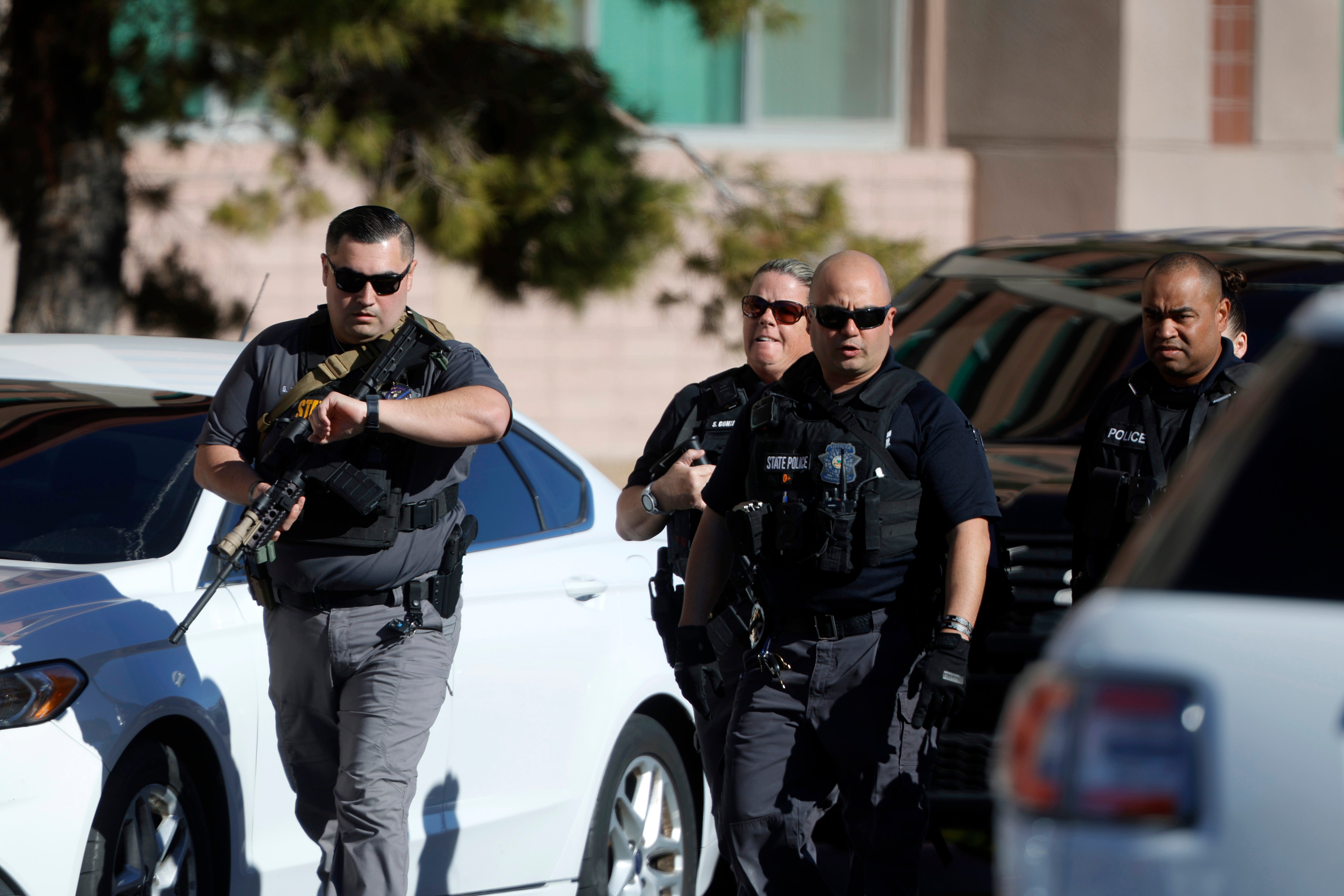 <p>Nevada State Police officers head onto the University of Nevada, Las Vegas, campus after a shooting took place</p>