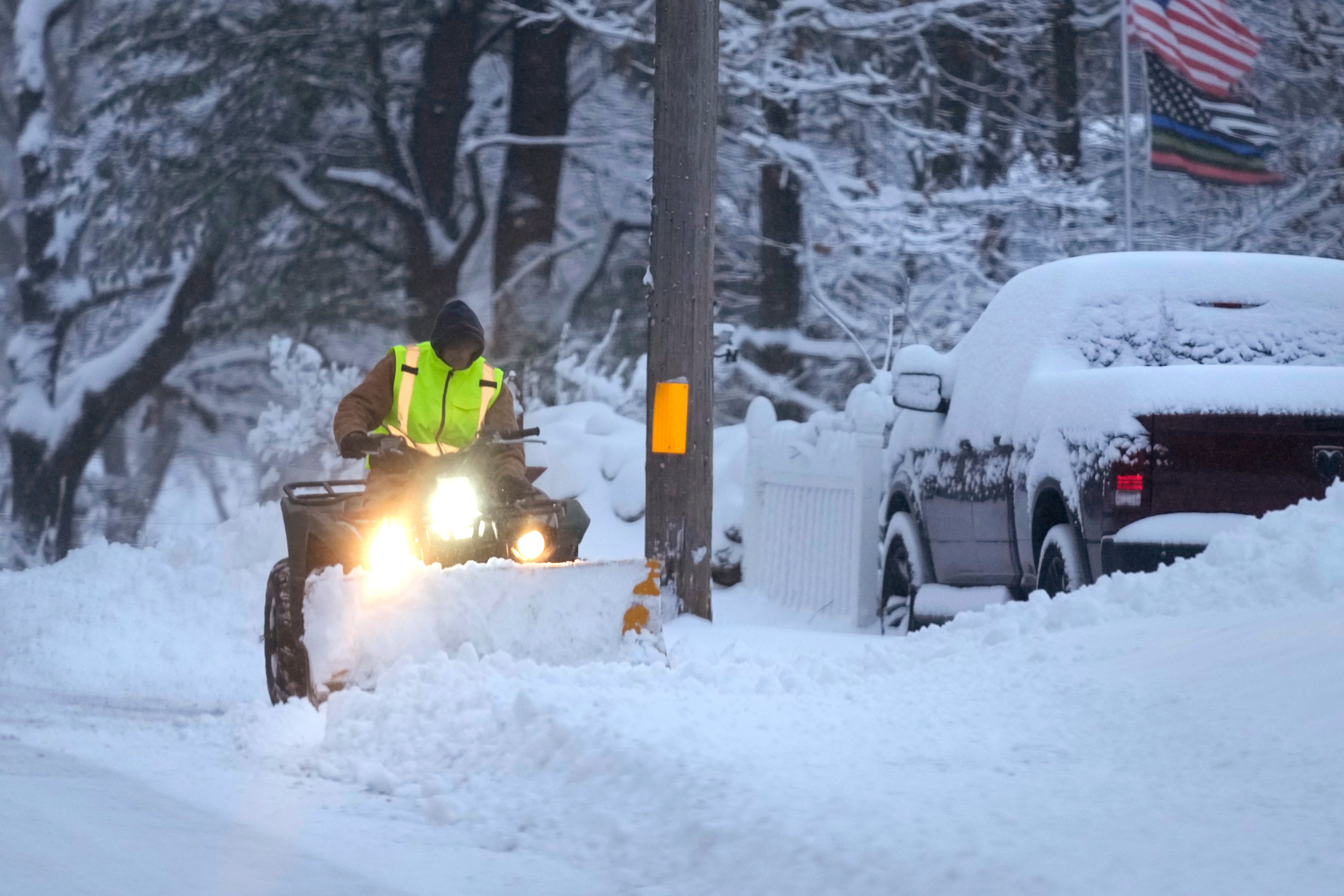 

<p>A man plows a snow-covered driveway on 7 January in Derry, New Hampshire</p>
<p>” height=”3263″ width=”4894″ layout=”responsive” i-amphtml-layout=”responsive”><i-amphtml-sizer slot=