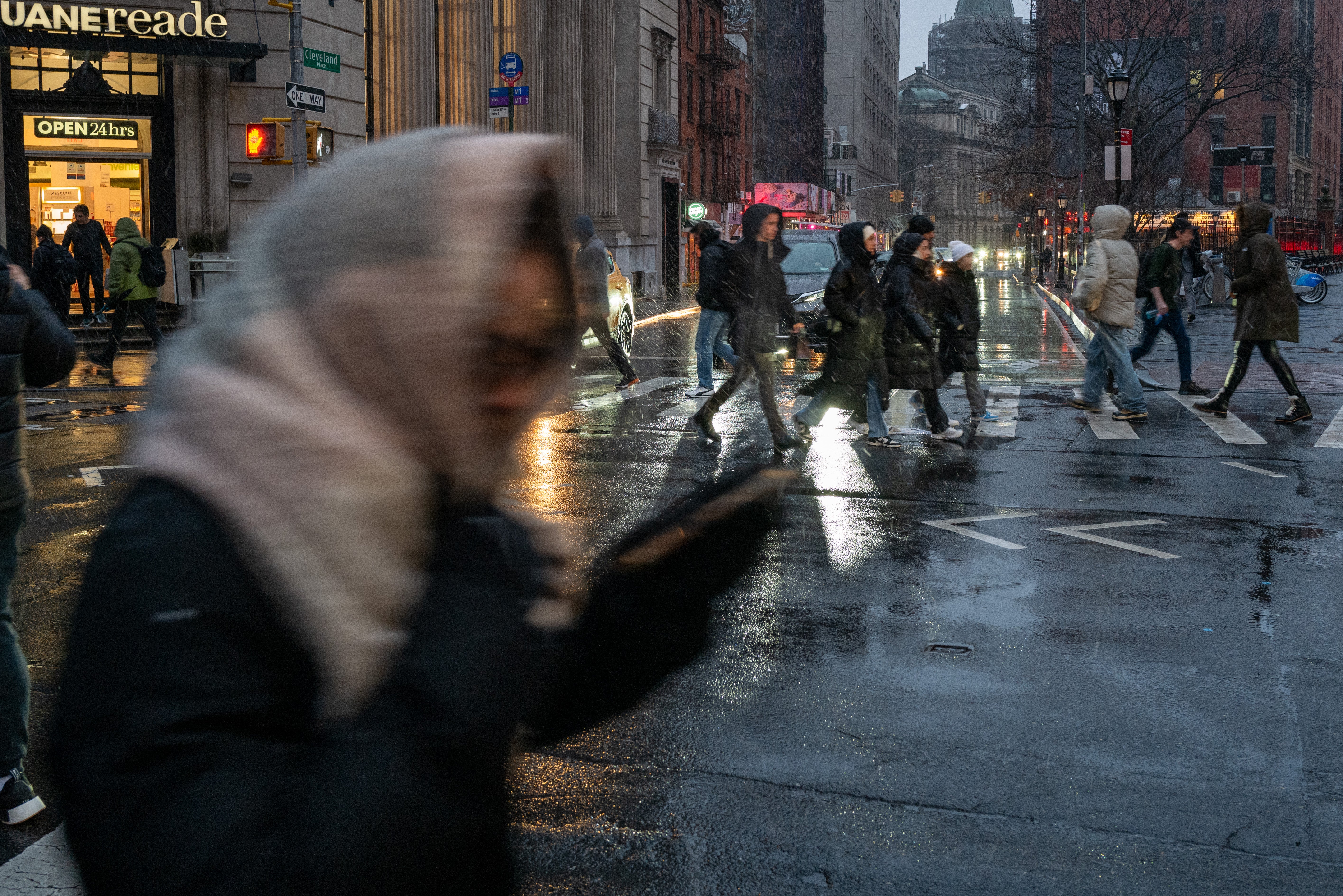 

<p>People walk through New York City amid wintry precipitation on 6 January</p>
<p>” height=”3780″ width=”5664″ layout=”responsive” i-amphtml-layout=”responsive”><i-amphtml-sizer slot=