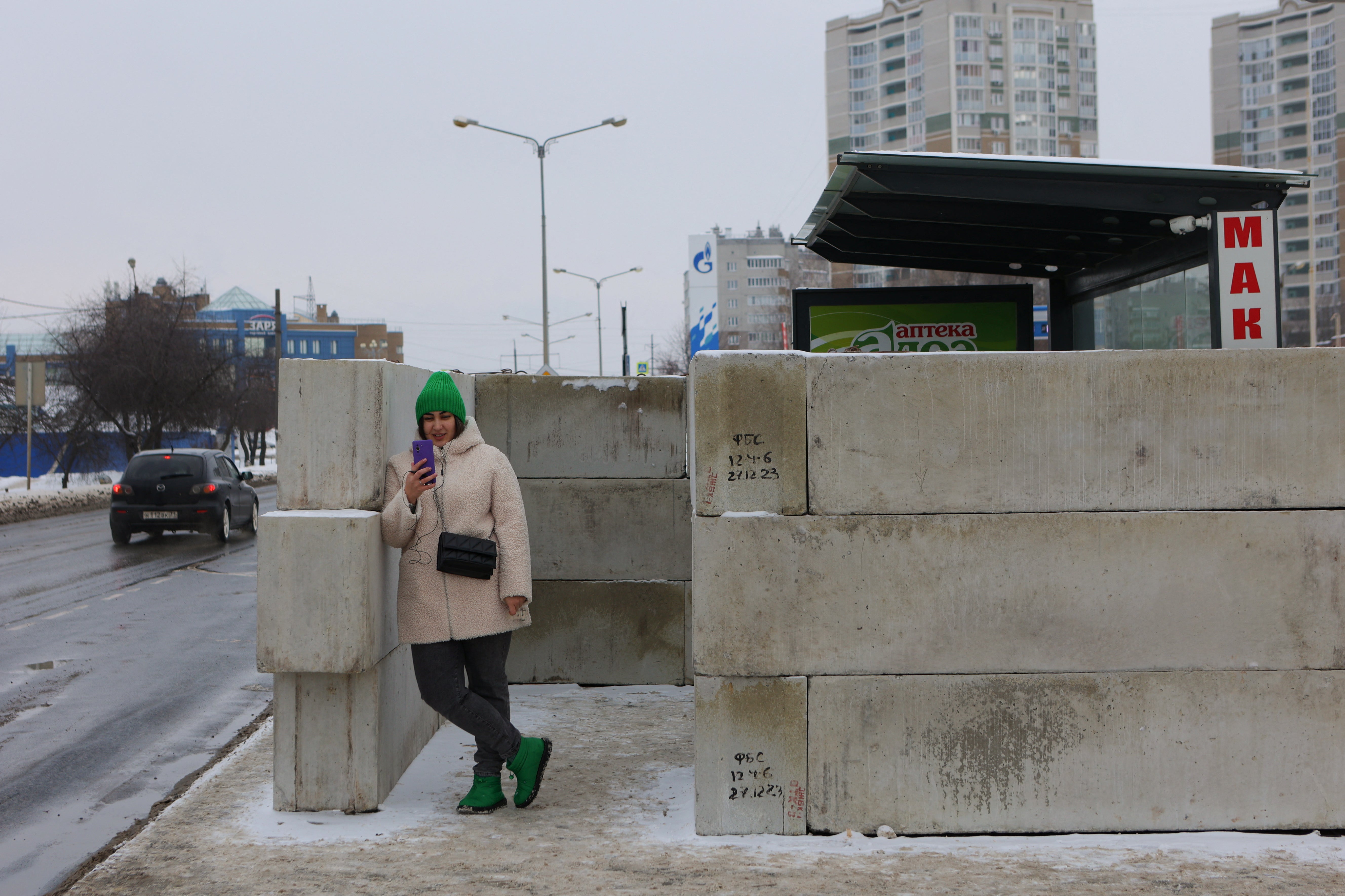 

<p>A woman waits at a bus stop protected with concrete blocks following recent alleged Ukrainian shelling attacks in Belgorod, the main city of Russia’s southwestern Belgorod region bordering Ukraine</p>
<p>” height=”3541″ width=”5311″ layout=”responsive” i-amphtml-layout=”responsive”><i-amphtml-sizer slot=