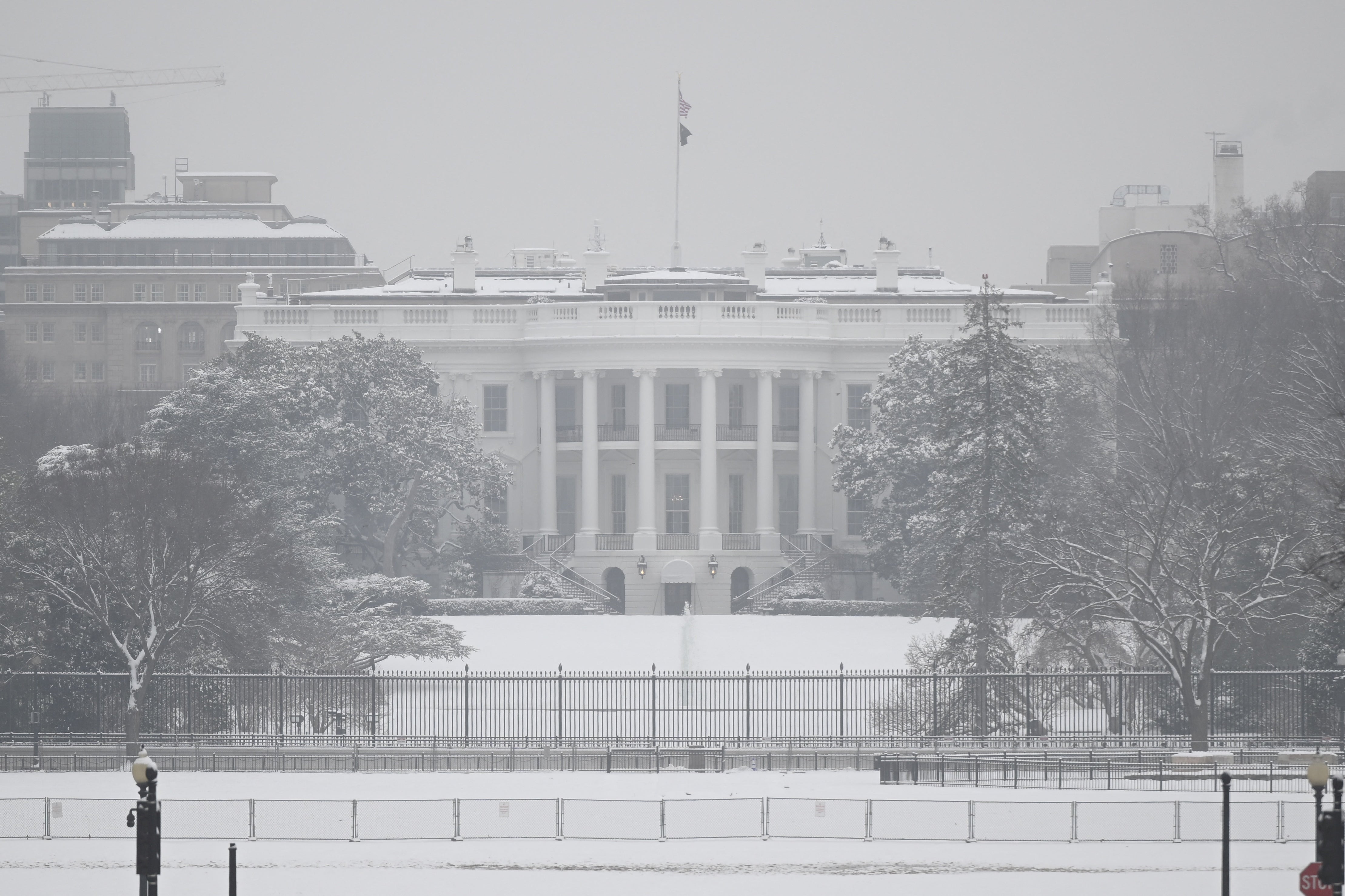 

<p>The White House is seen on a snowy day in Washington, DC, on January 16</p>
<p>” height=”2958″ width=”4437″ layout=”responsive” i-amphtml-layout=”responsive”><i-amphtml-sizer slot=