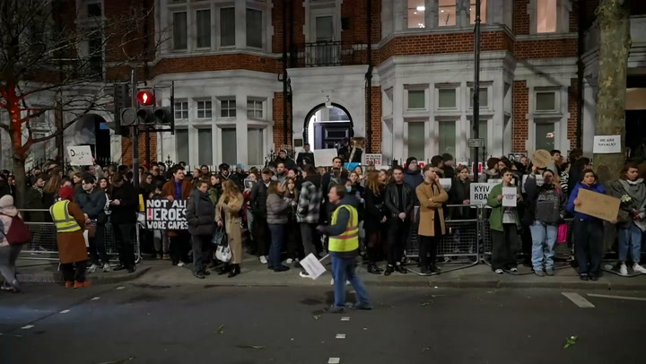 A large group of people have assembled outside the Russian embassy in London to hold a vigil for Alexei Navalny.