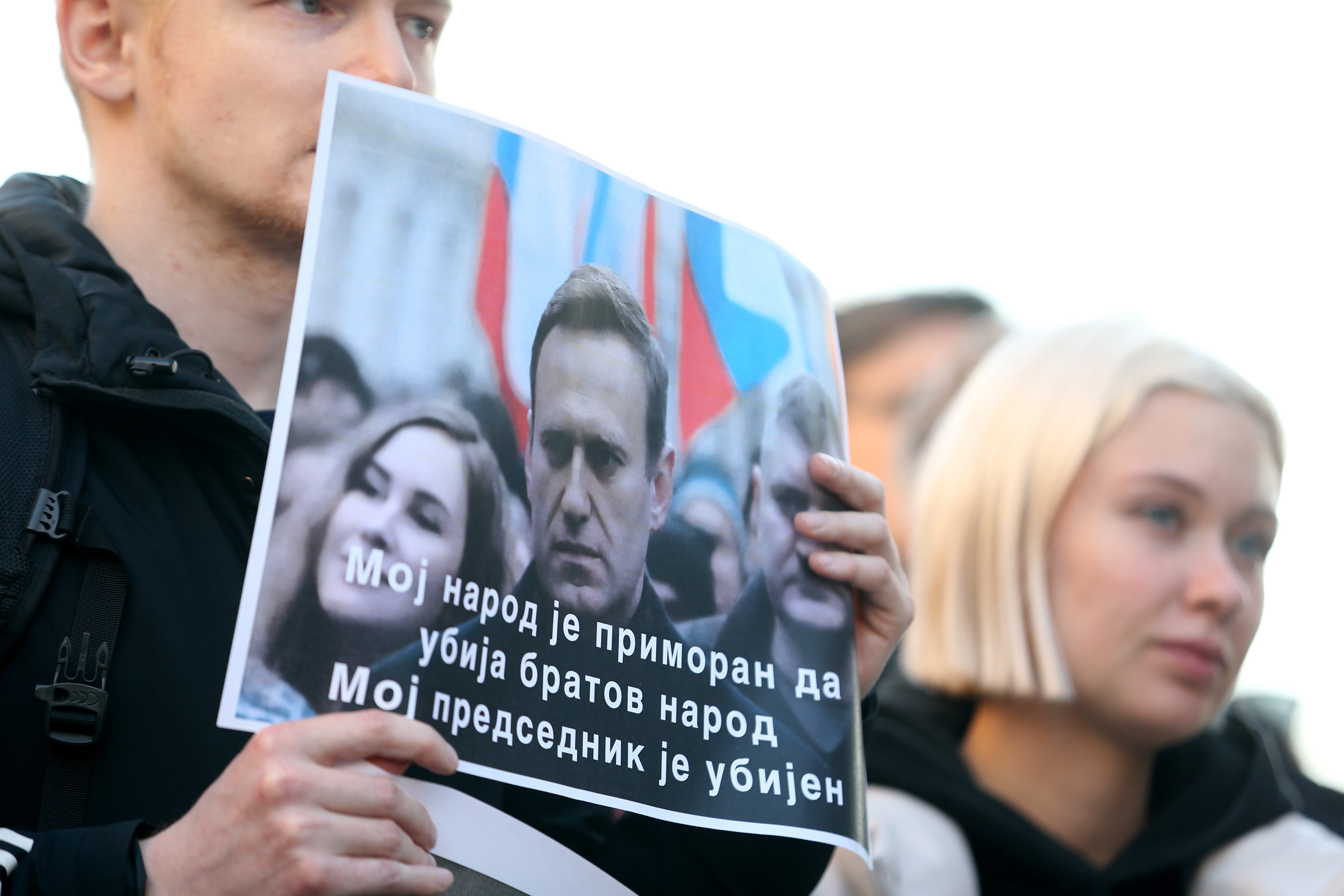 

<p>A man in Belgrade holds banners of Alexey Navalny with the words ‘My people are forced to kill brother’s people, My President has been murdered’</p>
<p>” height=”3456″ width=”5184″ layout=”responsive” i-amphtml-layout=”responsive”><i-amphtml-sizer slot=