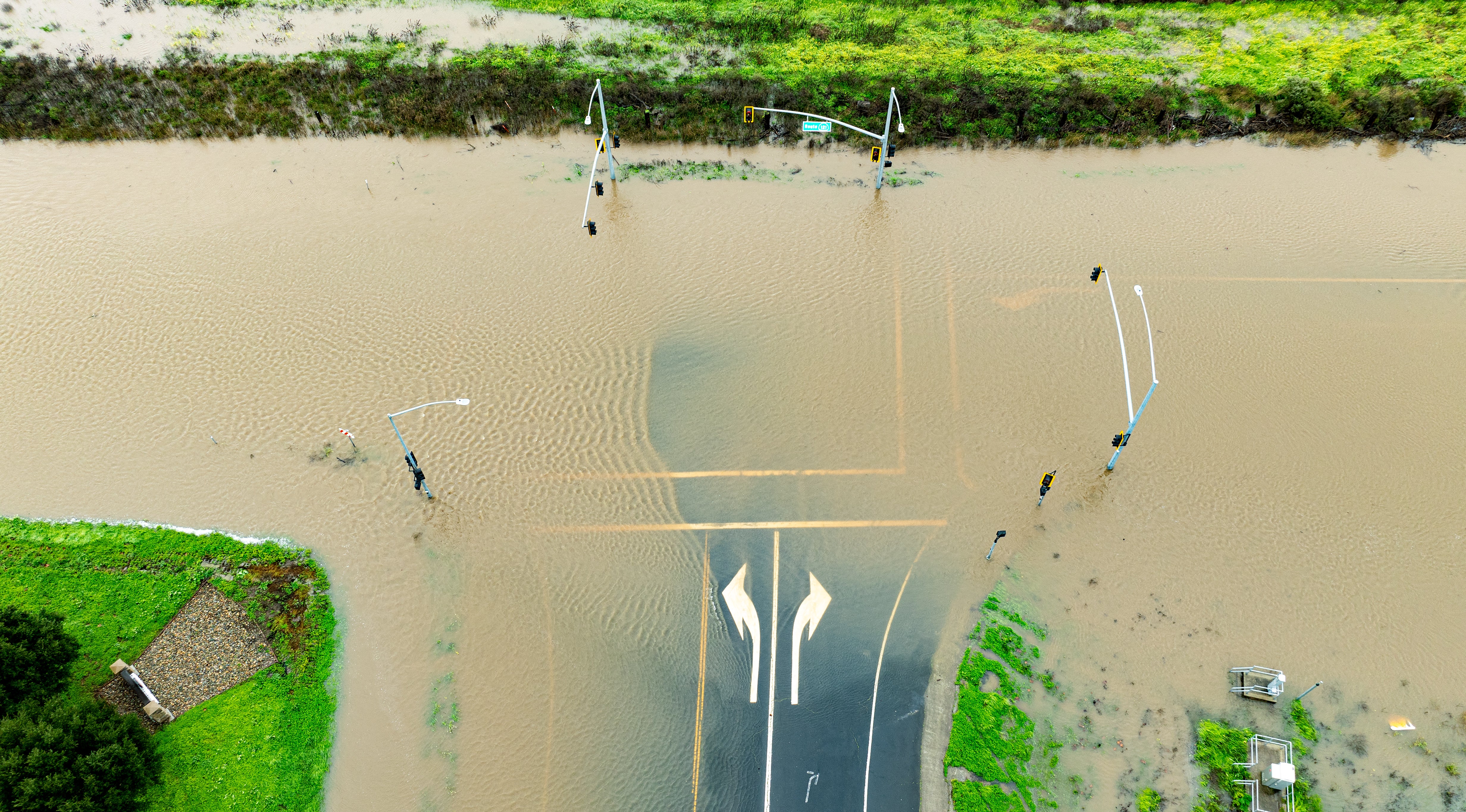 

<p>A closed roadway is seen flooded in Sonoma, California on February 4, 2024</p>
<p>” height=”2731″ width=”4928″ layout=”responsive” i-amphtml-layout=”responsive”><i-amphtml-sizer slot=