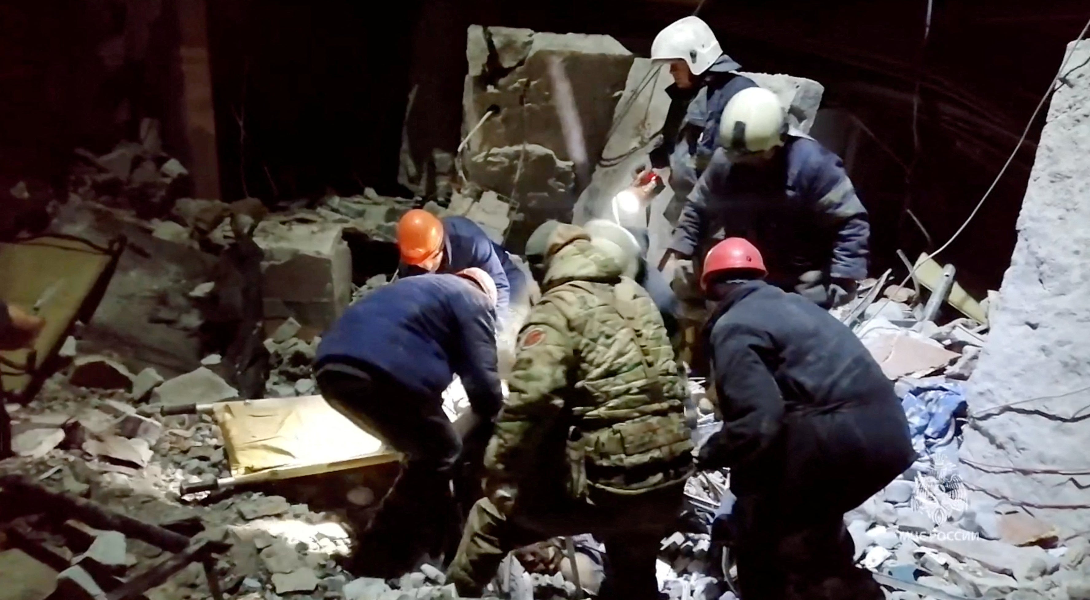 

<p>Emergency responders retrieve bodies from the rubble of a devastated building following a Ukrainian attack on the city of Lysychansk</p>
<p>” height=”1955″ width=”3551″ layout=”responsive” i-amphtml-layout=”responsive”><i-amphtml-sizer slot=