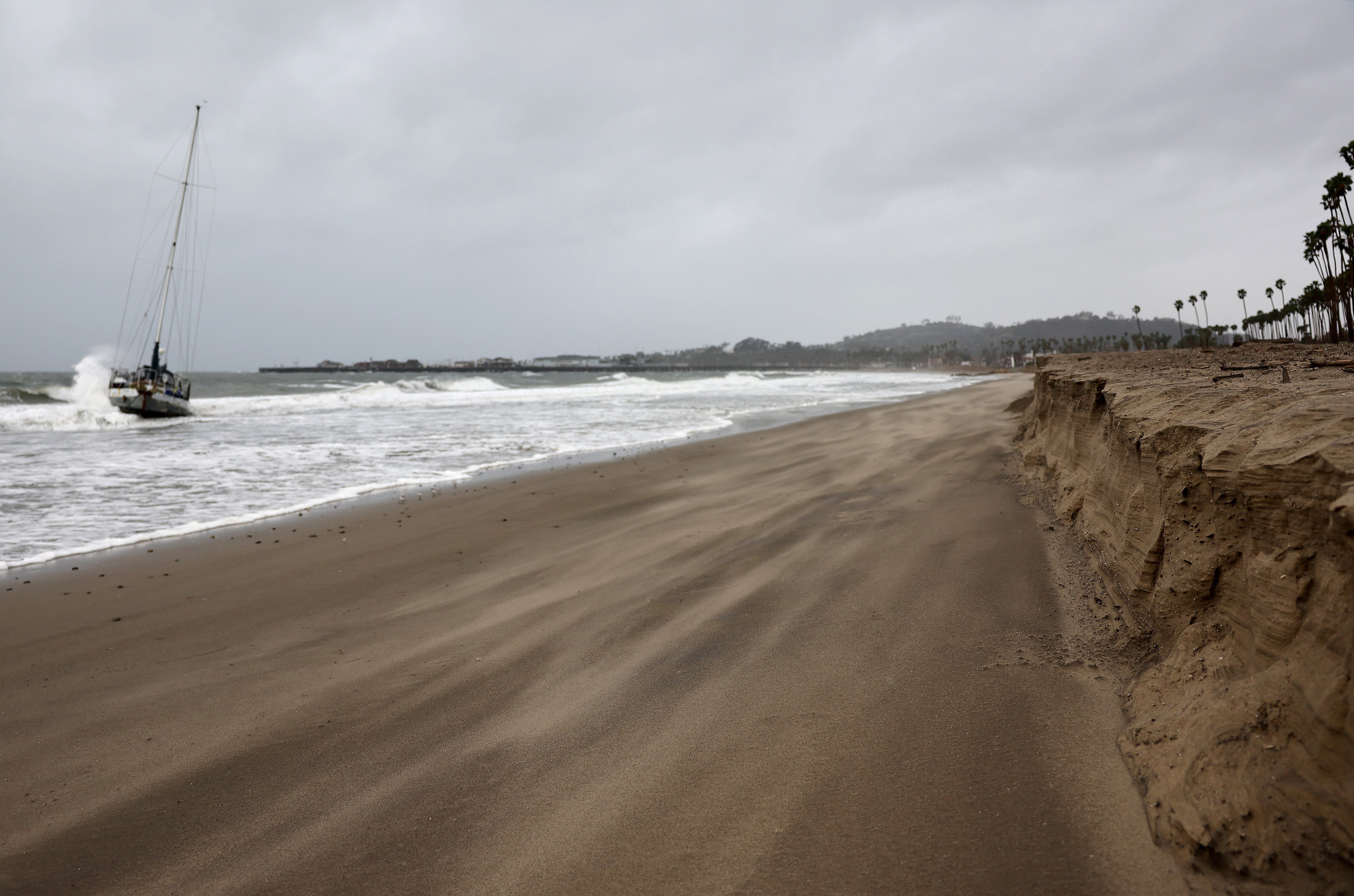 

<p>Sand blows as a wave hits a boat which washed ashore as a powerful long-duration atmospheric river storm, the second in less than a week, impacts California on February 4, 2024 in Santa Barbara, California</p>
<p>” height=”3893″ width=”5882″ layout=”responsive” i-amphtml-layout=”responsive”><i-amphtml-sizer slot=