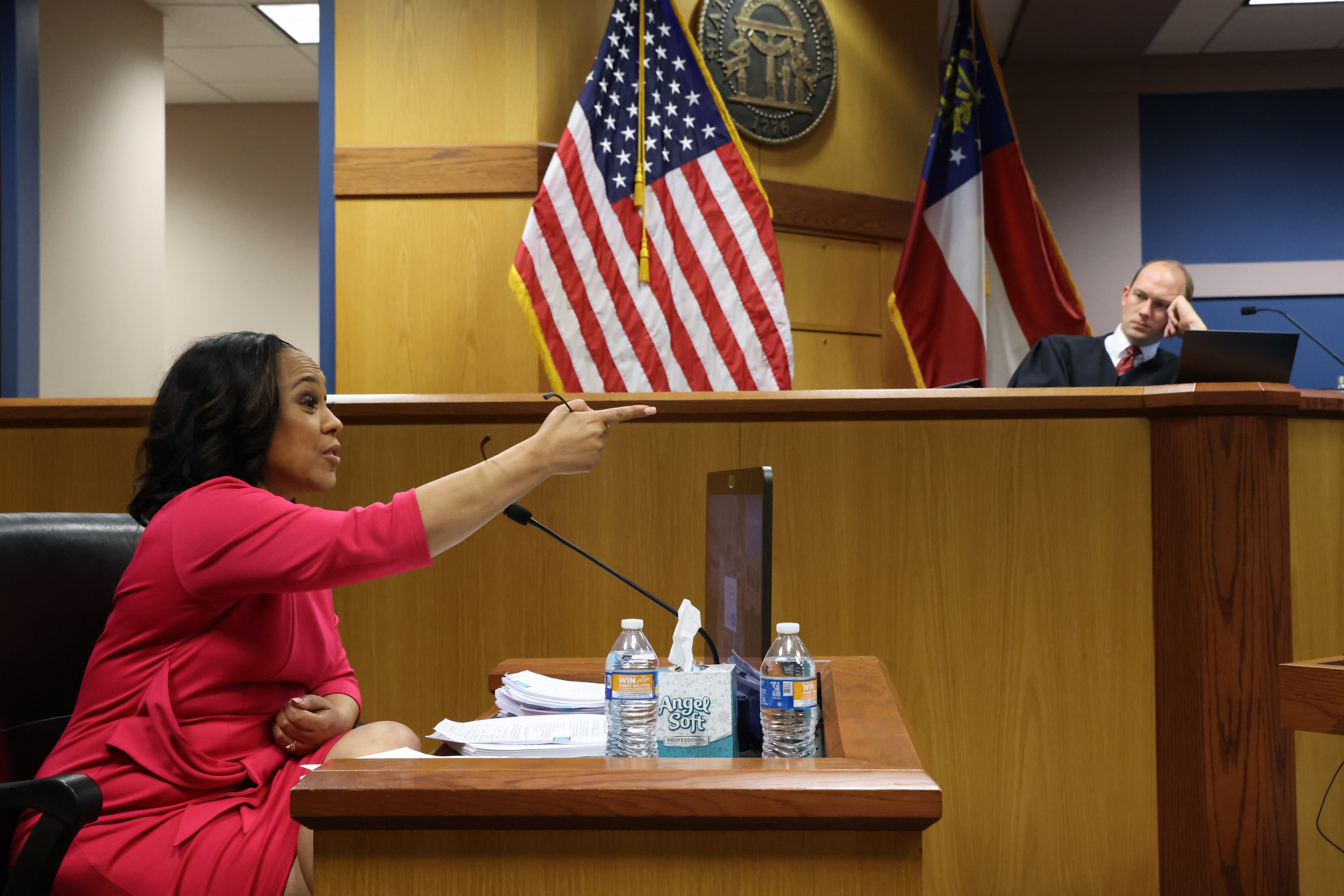 

<p>Attorney Fani Willis speaks from a witness stand in front of Fulton County Superior Judge Scott McAfee during a hearing in the case of State of Georgia v Donald Trump</p>
<p>” height=”3577″ width=”5365″ layout=”responsive” i-amphtml-layout=”responsive”><i-amphtml-sizer slot=