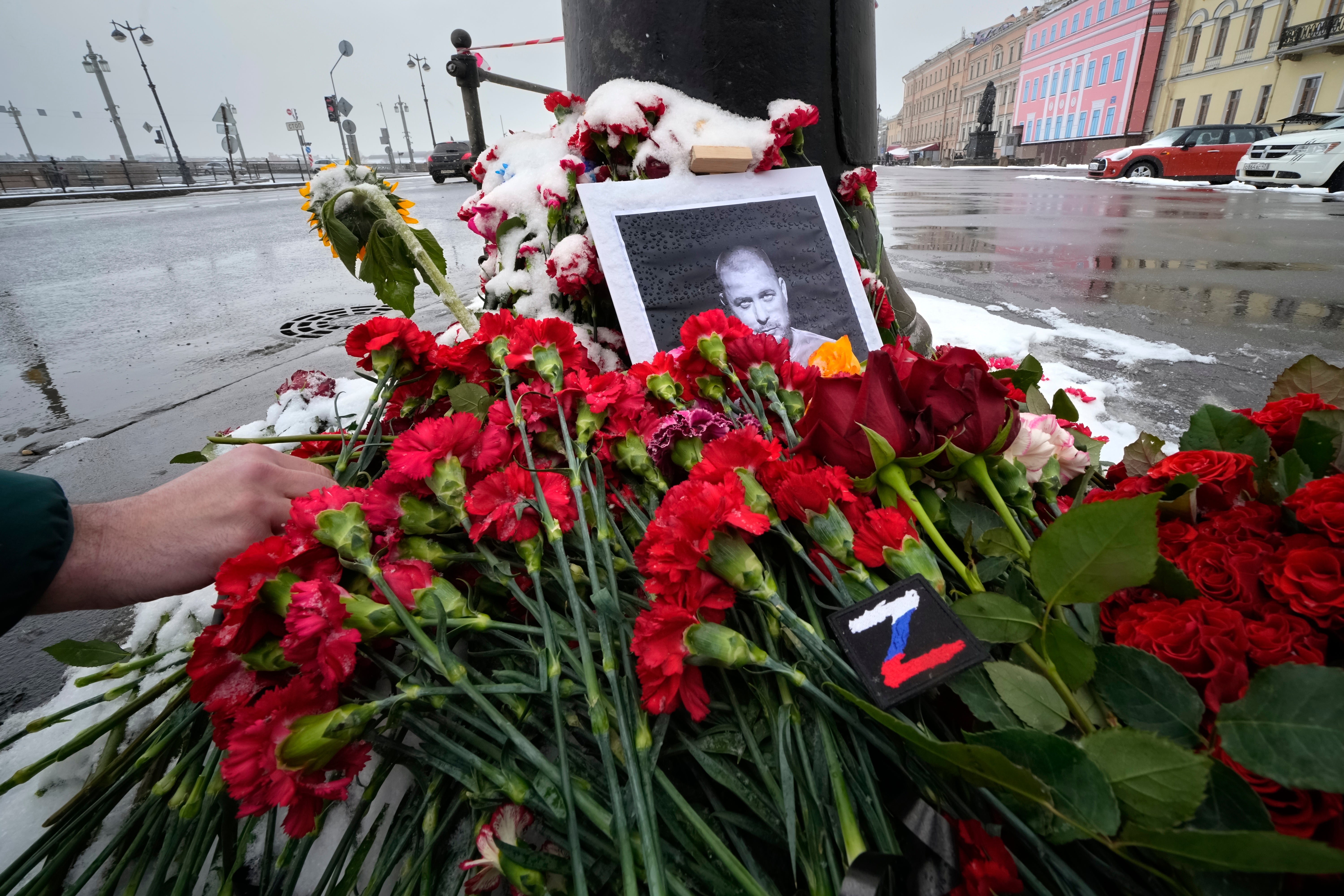 

<p>Tributes left for Vladlen Tatarsky who was killed in a cafe in St Petersburg  </p>
<p>” height=”4000″ width=”6000″ layout=”responsive” i-amphtml-layout=”responsive”><i-amphtml-sizer slot=