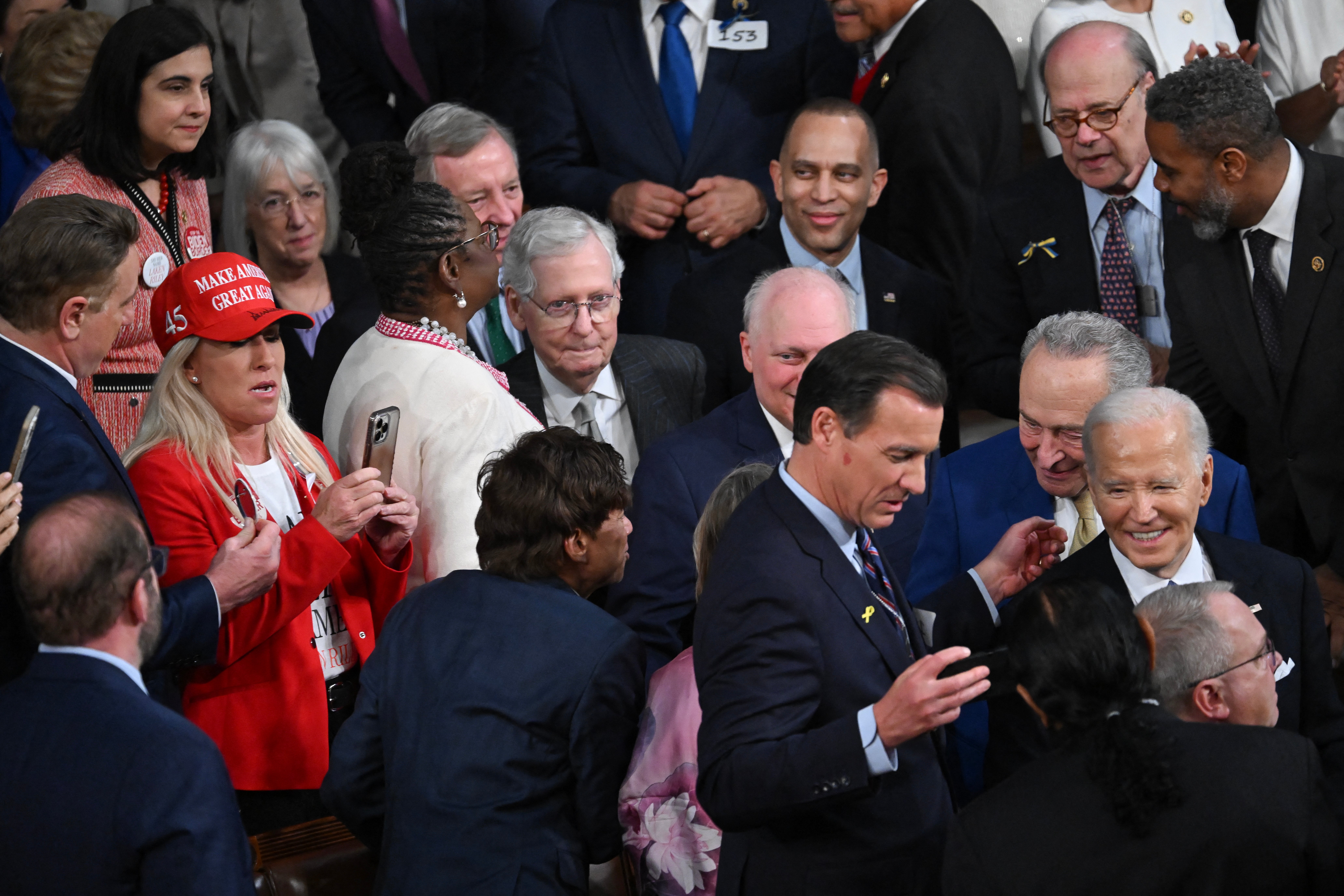 

<p>US Representative Marjorie Taylor-Greene (R-GA) wears a MAGA hat as President Joe Biden arrives to deliver the State of the Union</p>
<p>” height=”5504″ width=”8256″ layout=”responsive” i-amphtml-layout=”responsive”><i-amphtml-sizer slot=