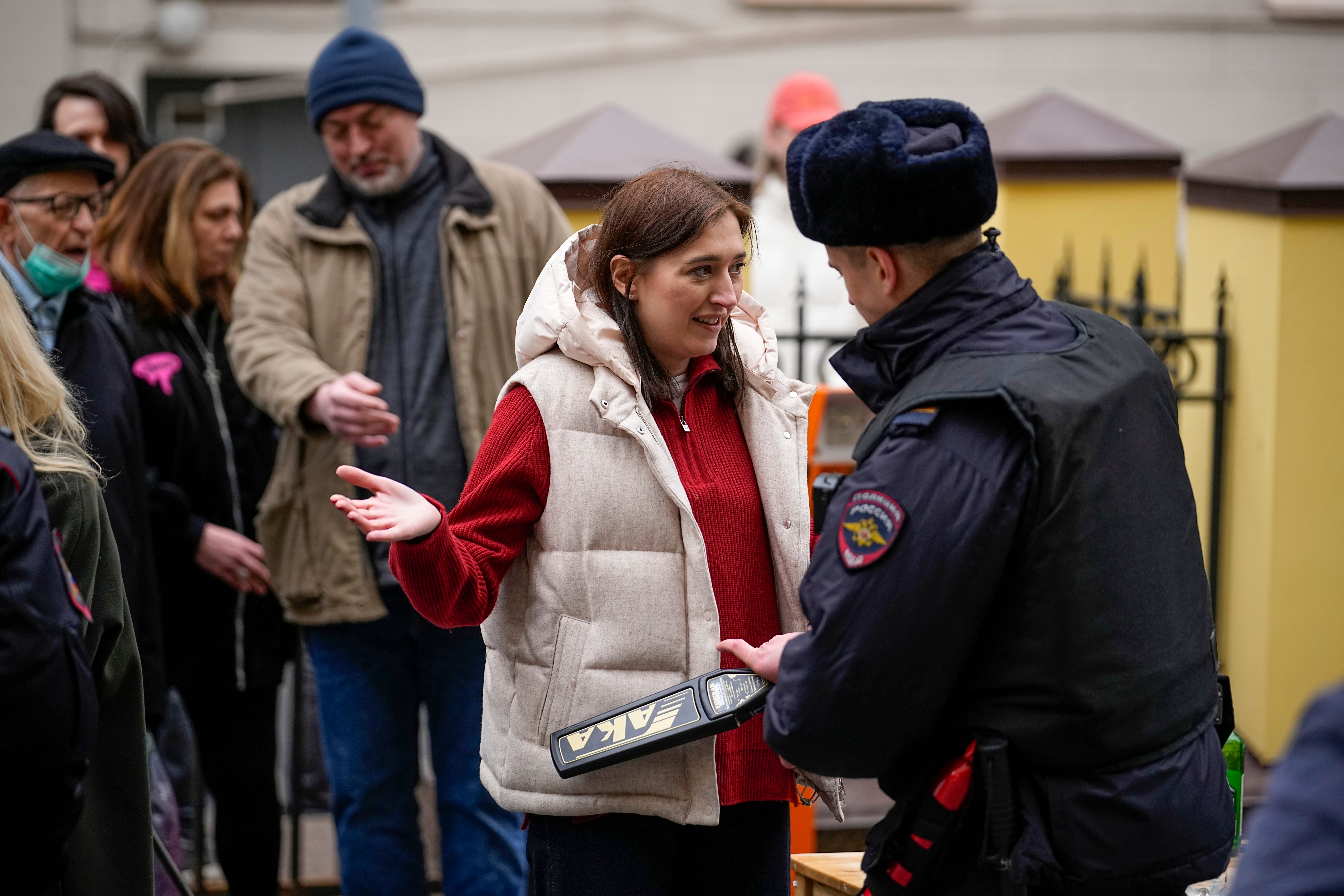 

<p>A woman is checked before entering a polling station in Moscow, Russia, on Sunday</p>
<p>” height=”4000″ width=”6000″ layout=”responsive” i-amphtml-layout=”responsive”><i-amphtml-sizer slot=