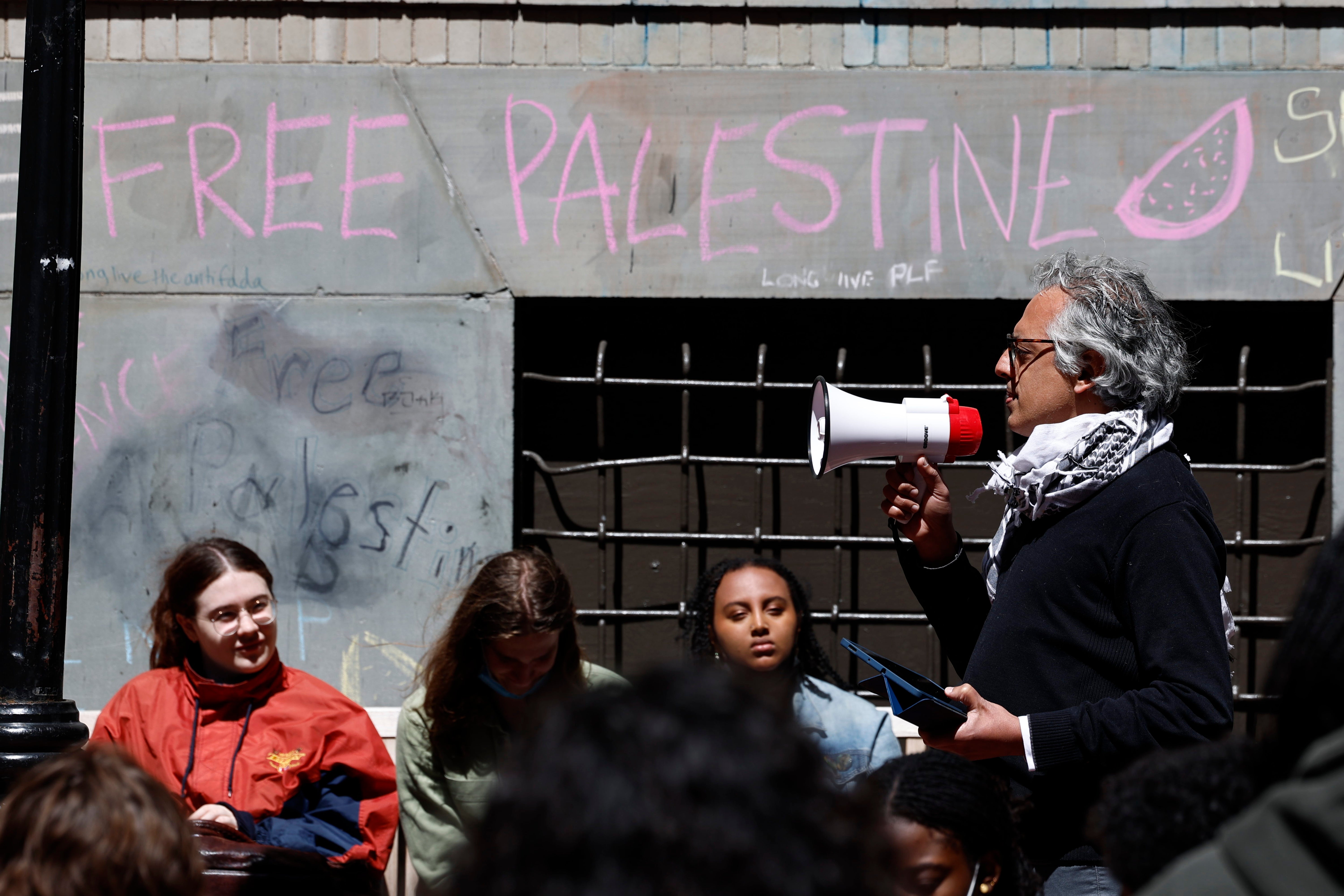 Students at Emerson College listen to a speaker as they occupy a 'tent city' in an alley adjacent to the college campus as they protest Emerson's ties to Israel, in Boston, Massachusetts, USA, 22 April 2024