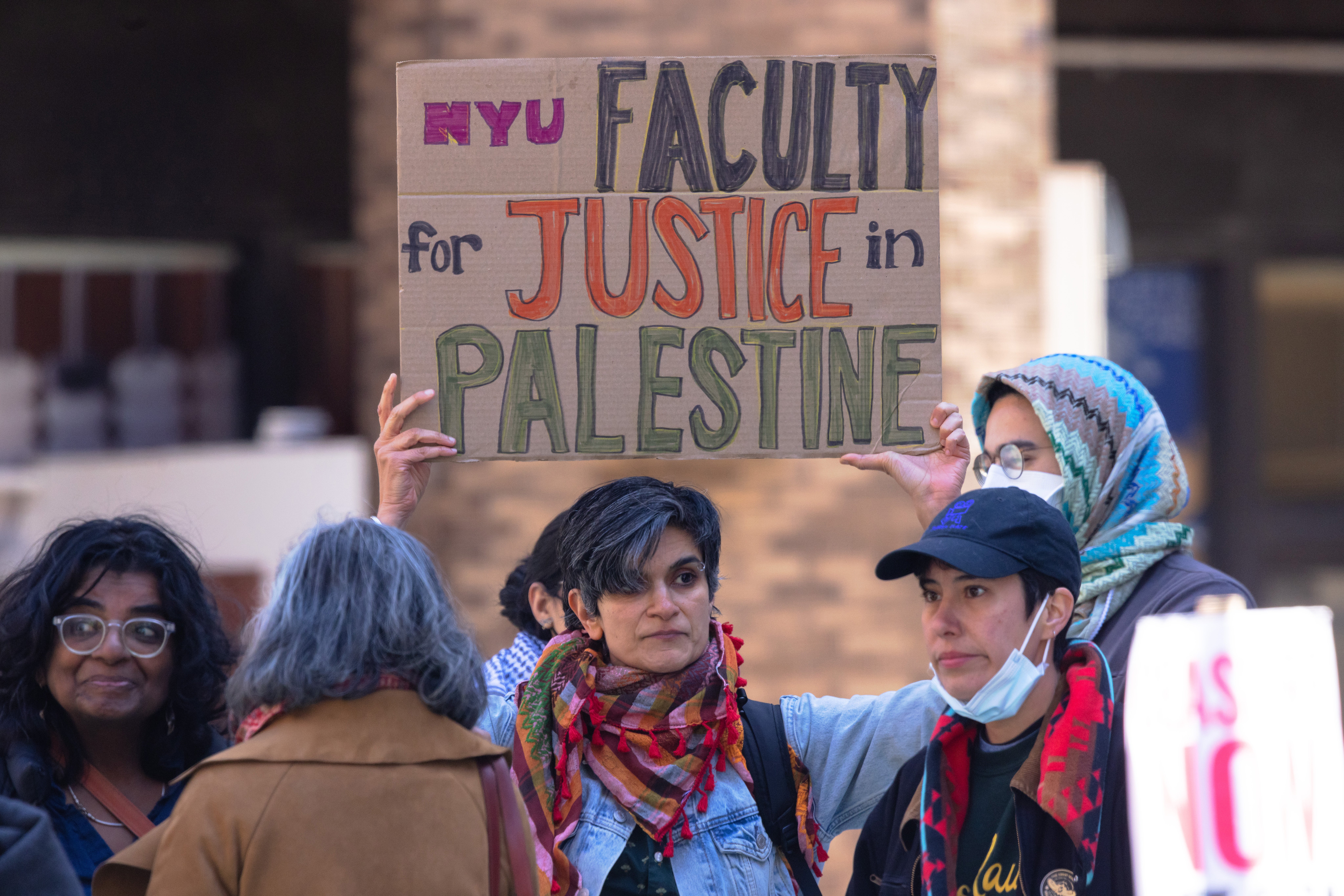 New York University students set up a "Liberated Zone" tent encampment in Gould Plaza at NYU Stern School of Business on April 22, 2024 in New York City.
