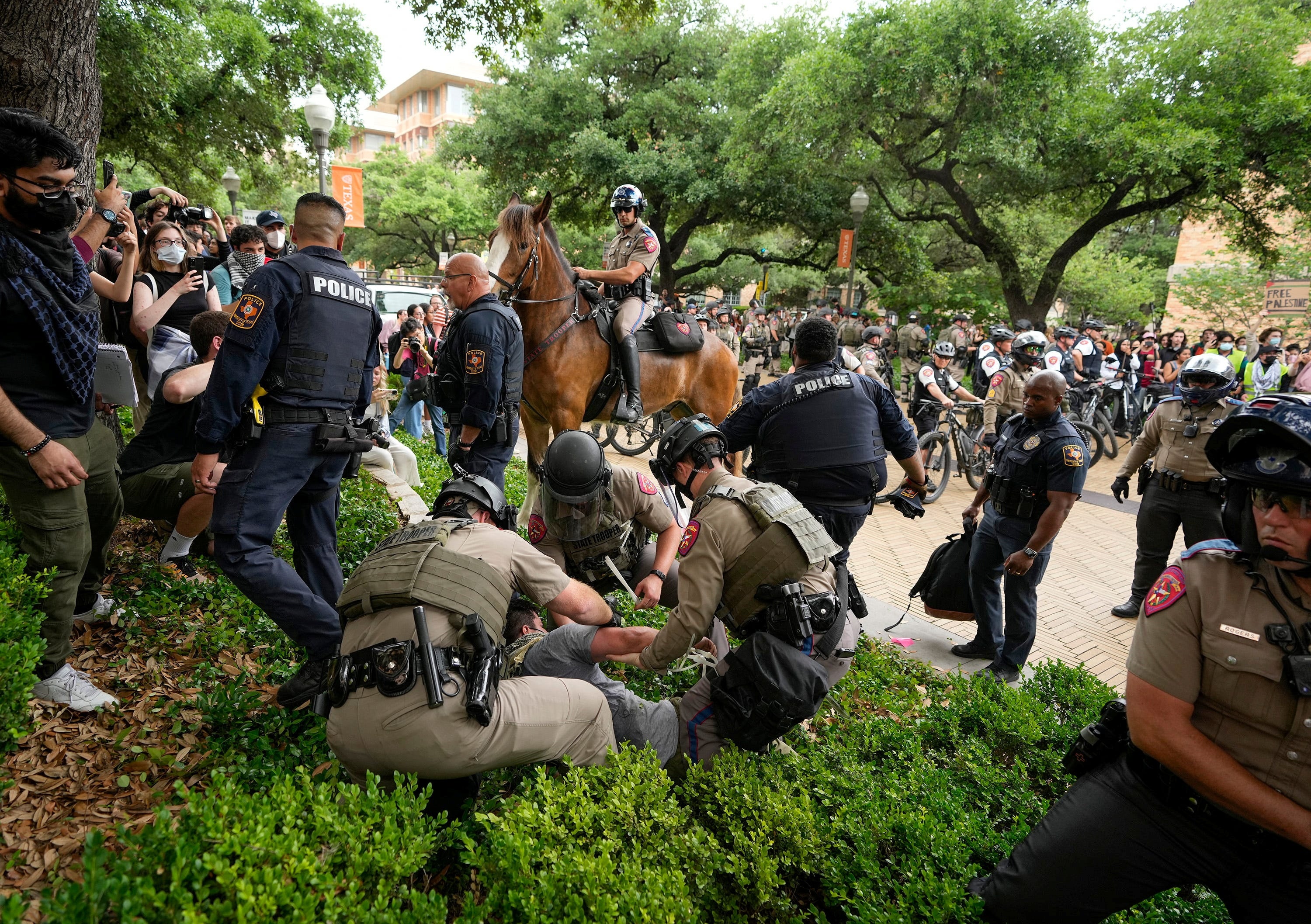 Texas state troopers arrest a man at a pro-Palestinian protest at the University of Texas, during the ongoing conflict between Israel and the Palestinian Islamist group Hamas, in Austin, Texas, U.S. April 24, 2024