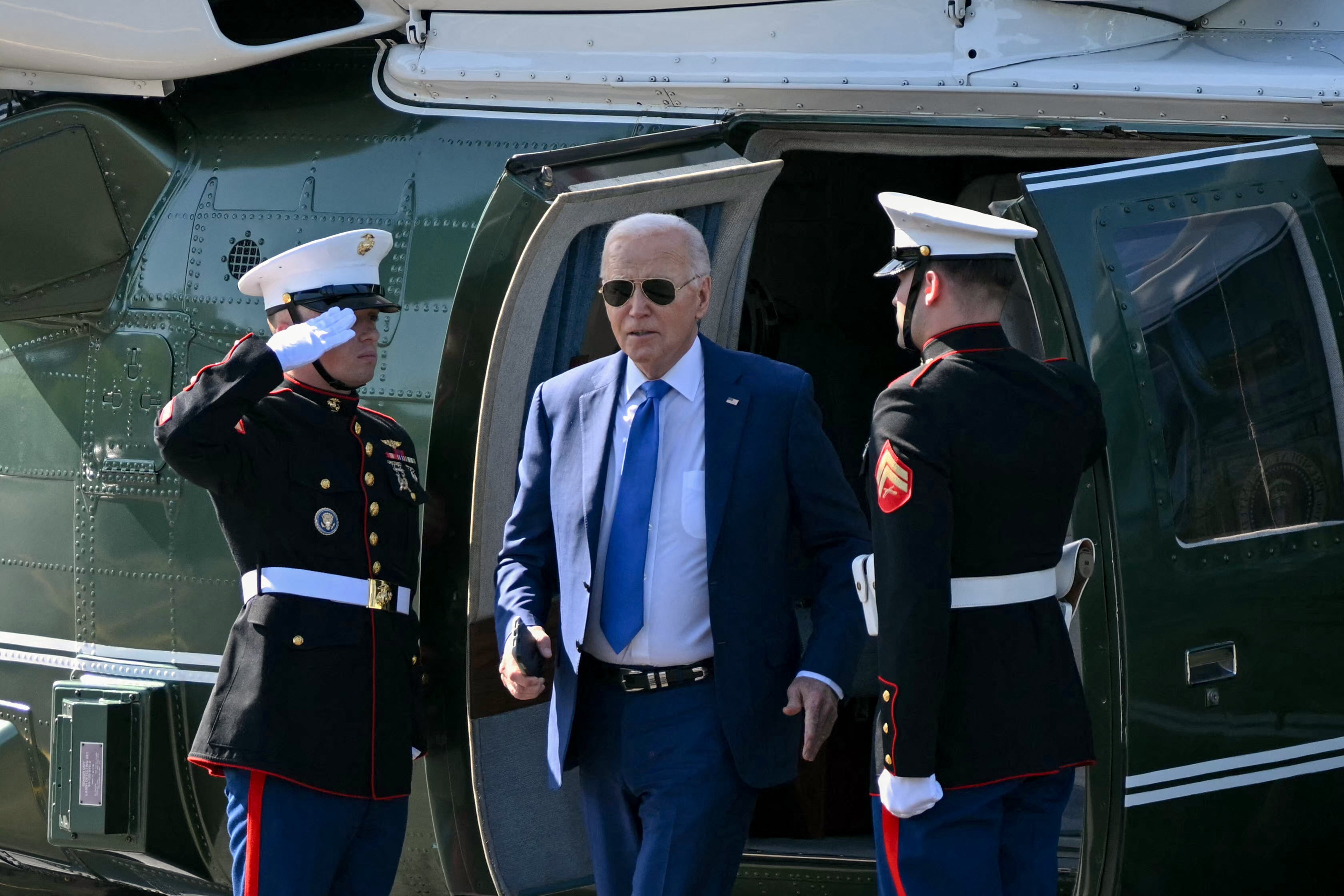 US president Joe Biden steps off Marine One upon arrival at Soldier Field Landing Zone in Chicago, Illinois, on 8 May 2024