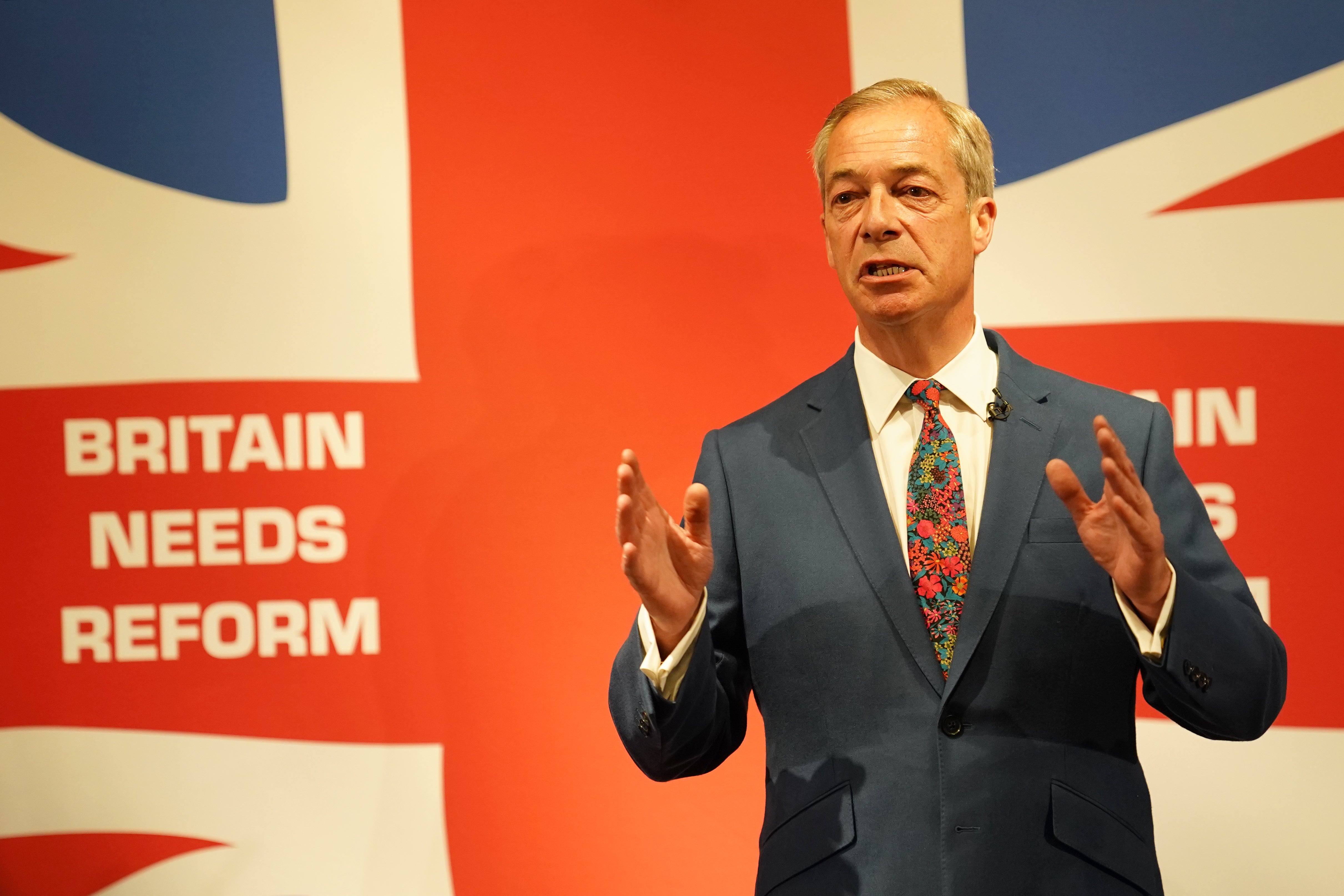 Nigel Farage speaks during a press conference to announce their party's legal immigration policy at The Glaziers Hall in London