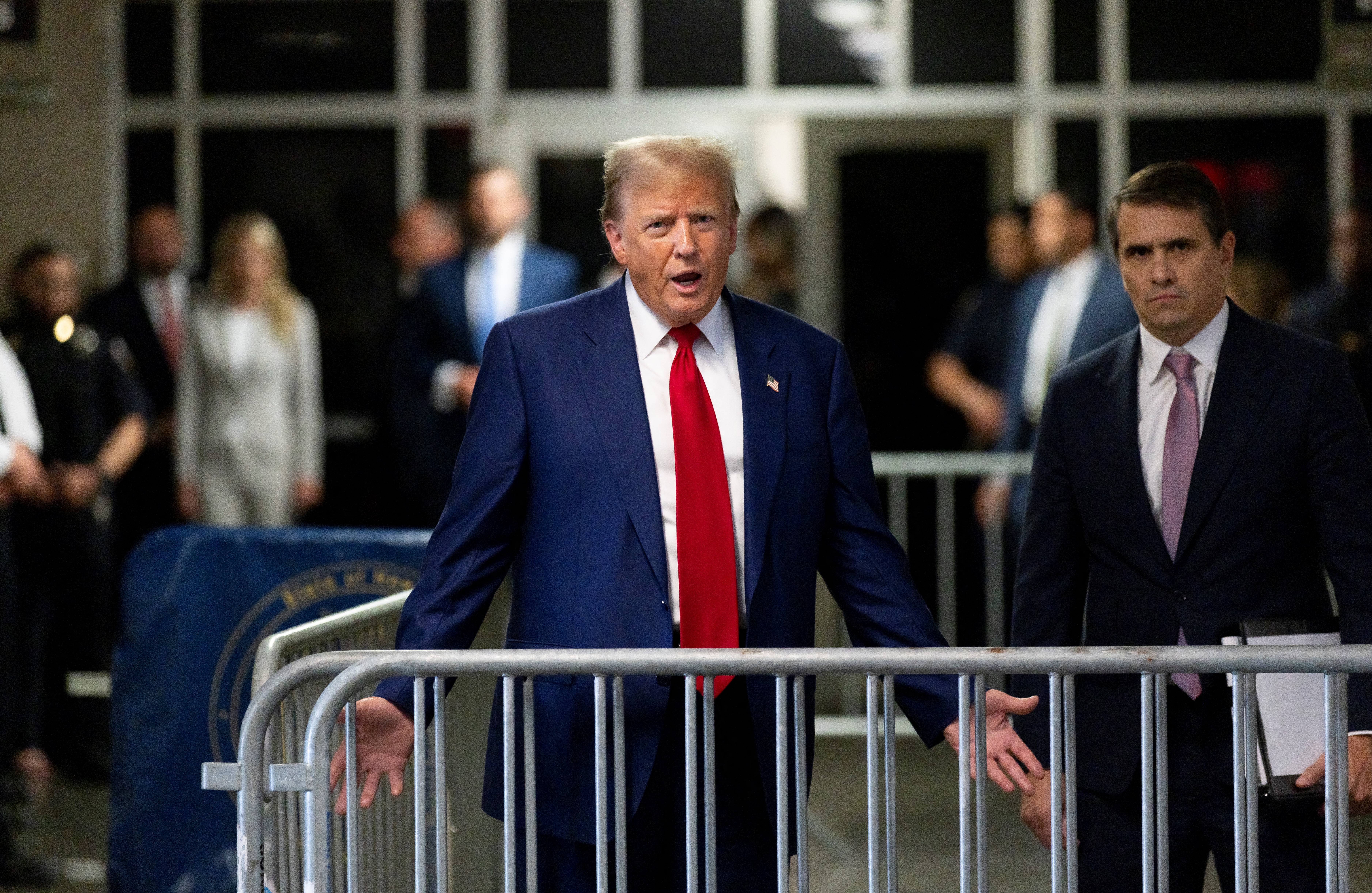 Former US President Donald Trump speaks to press during his trial for allegedly covering up hush money payments linked to extramarital affairs, at Manhattan Criminal Court in New York on April 30, 2024