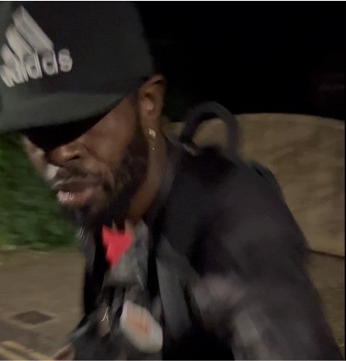 The force has released two pictures of him, showing a black man with a beard, wearing a black Adidas baseball cap, black jeans, a black jacket and black trainers with thick white soles and carrying a black backpack.