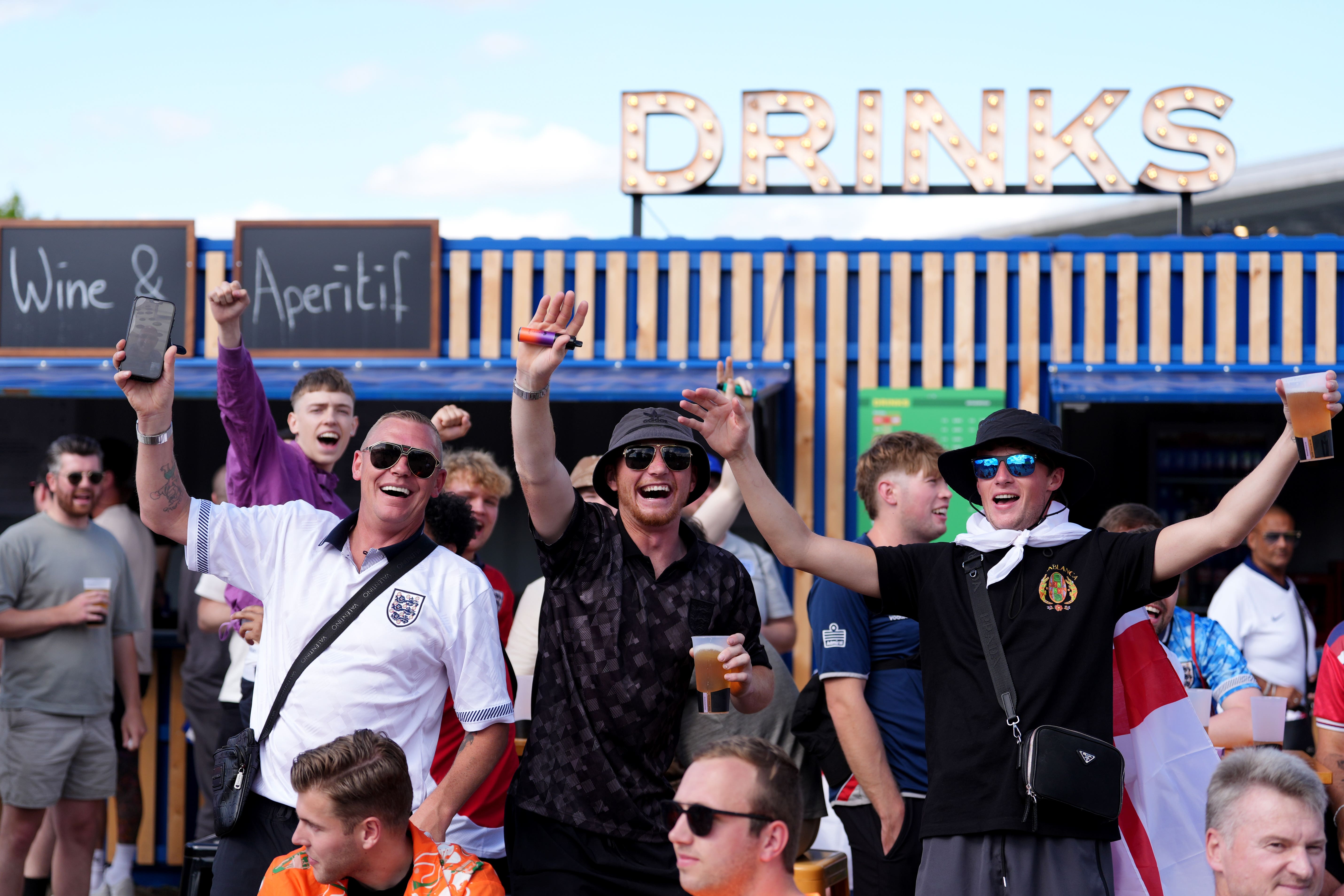 England fans enjoy a drink in Berlin