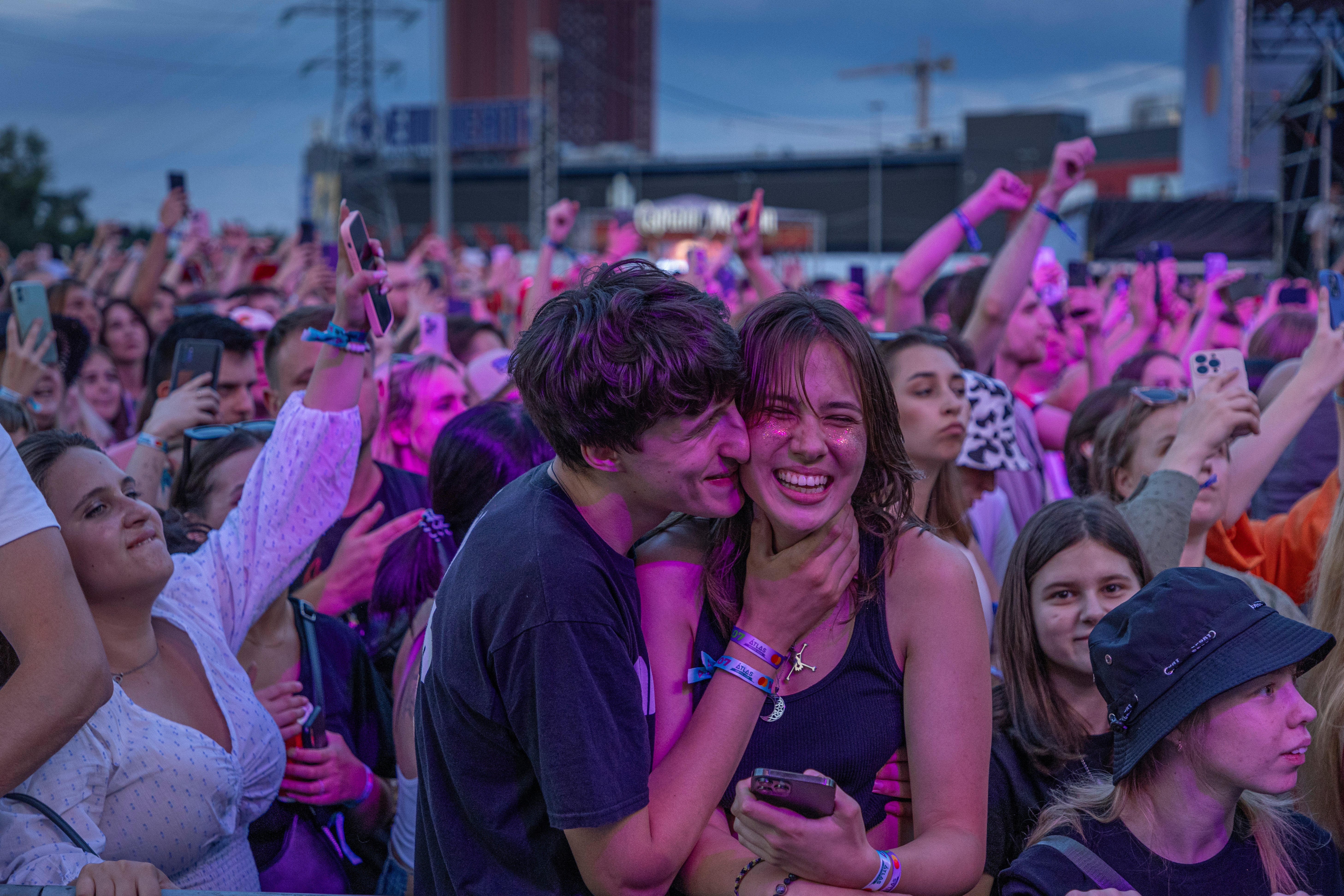 People enjoy a concert at the Atlas Festival in Kyiv, Ukraine