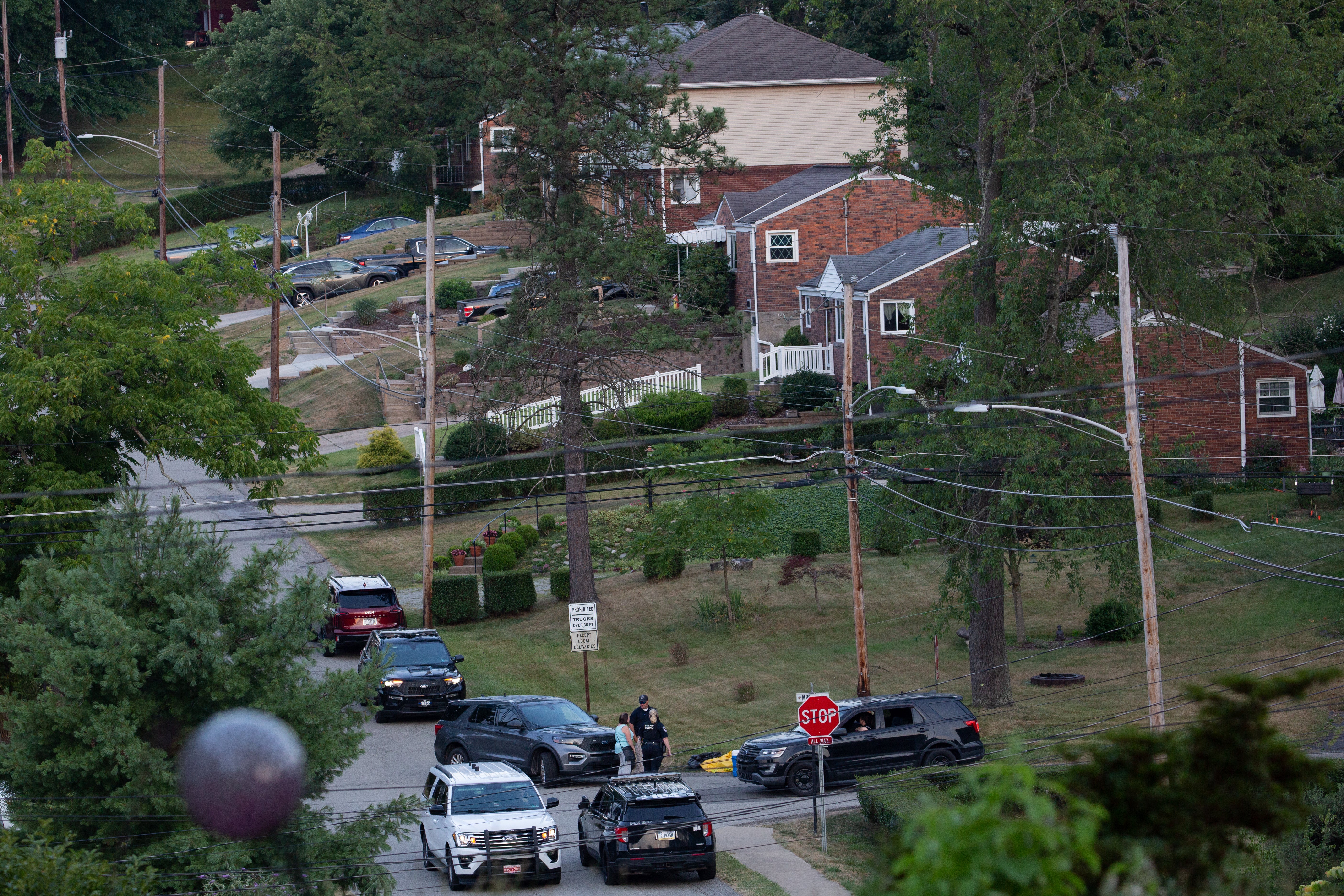 Police continue to block roads around the home of Thomas Matthew Crooks as the FBI continues its investigation into the attempted assassination of former US president Donald Trump in Bethel Park, Pennsylvania, on 14 July 2024