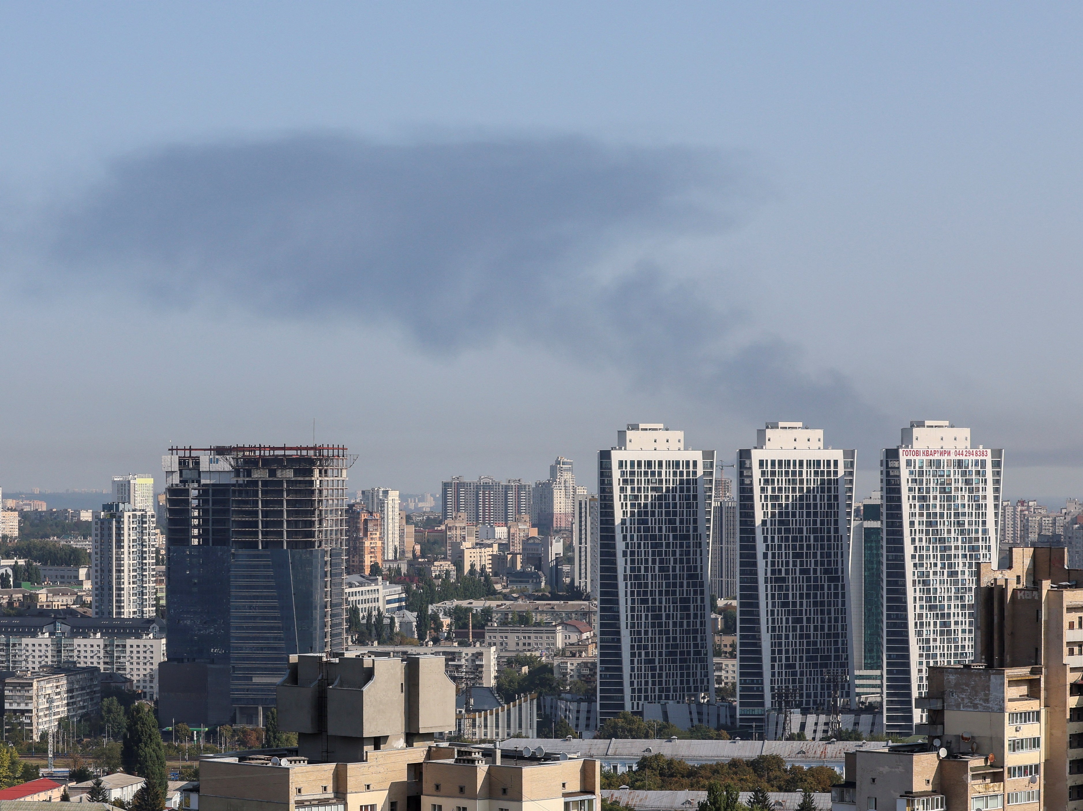 Smoke rises in the sky over Kyiv on Monday