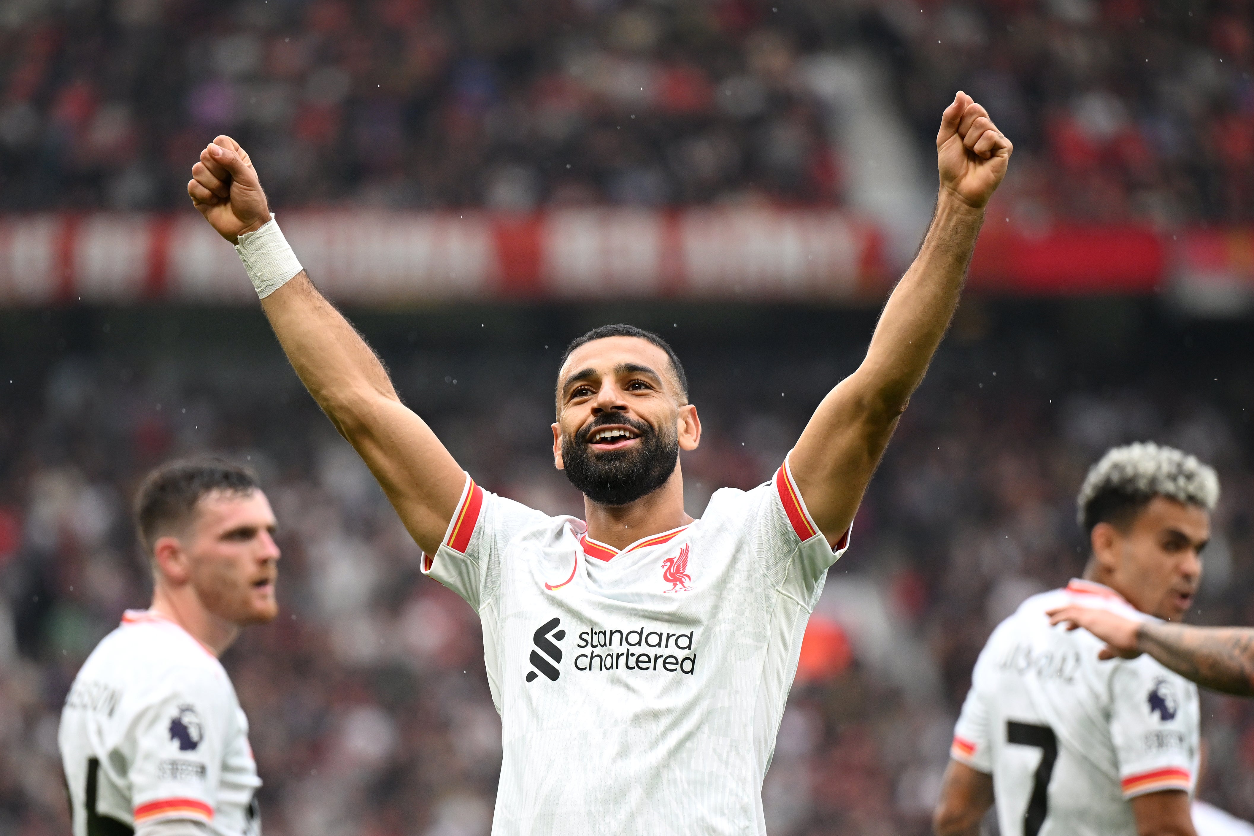 Mohamed Salah celebrates after scoring the third Liverpool goal