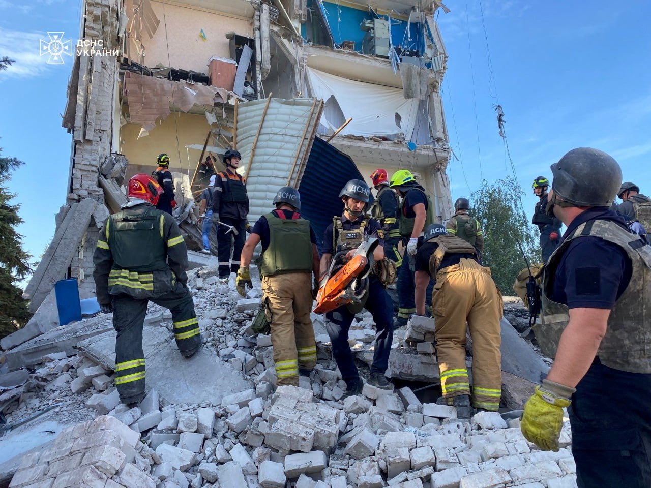 Rescuers work at the site of a Russian missile strike, amid Russia's attack on Ukraine, in Kryvyi Rih, Ukraine