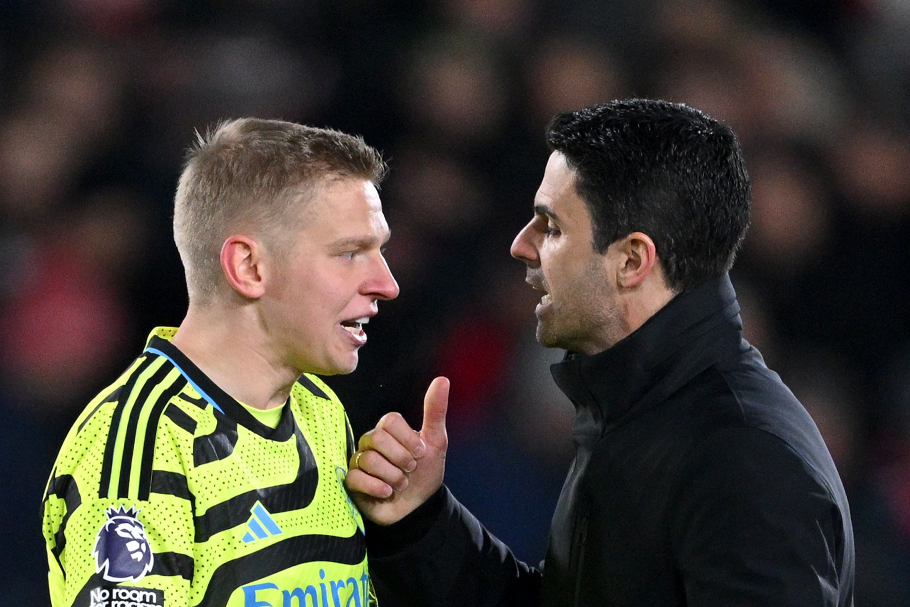 Arsenal coach Mikel Arteta (right) with Oleksandr Zinchenko