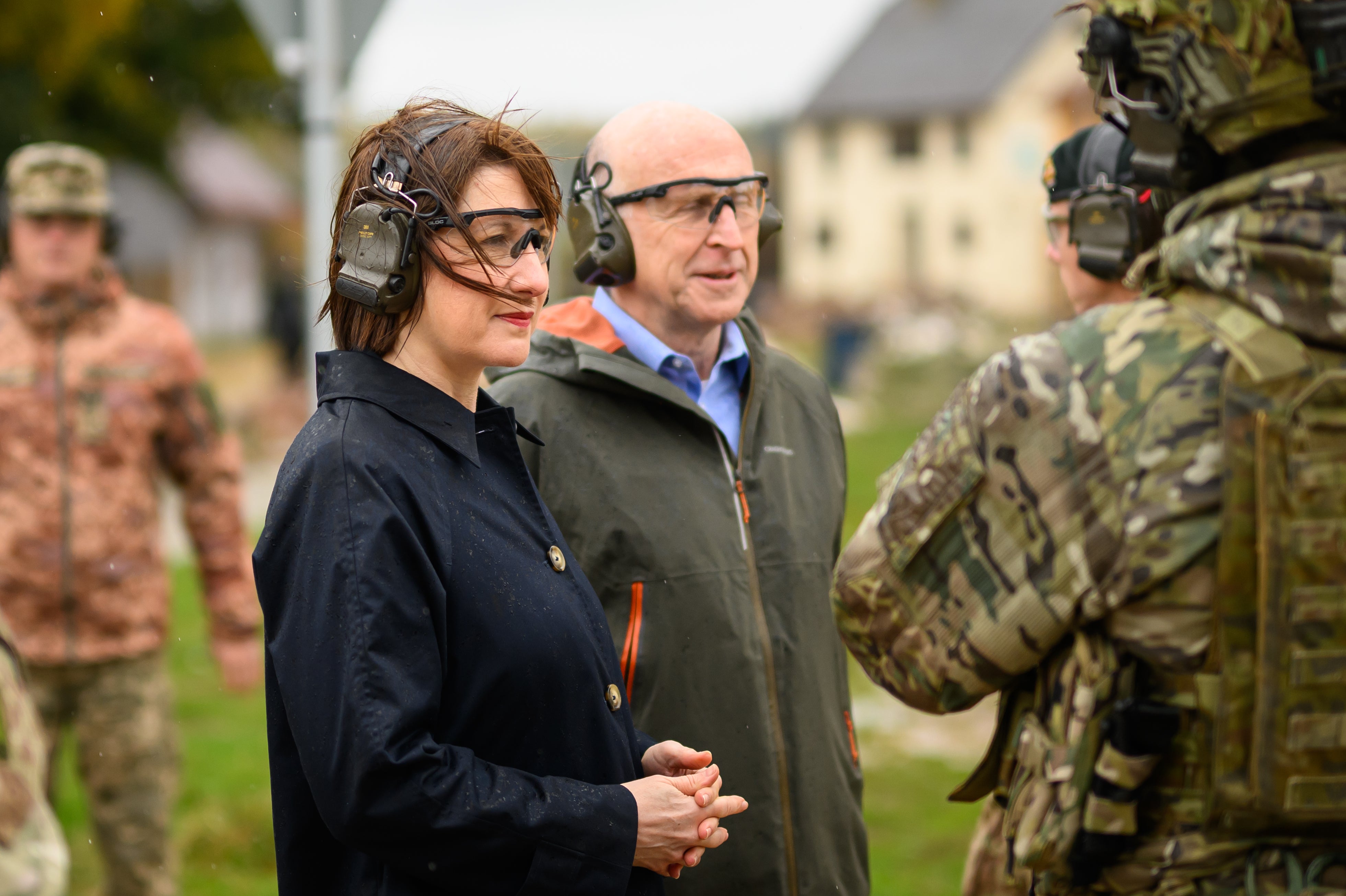 Chancellor Rachel Reeves and Defence Secretary John Healey with soldiers and staff at the Stanford training ground