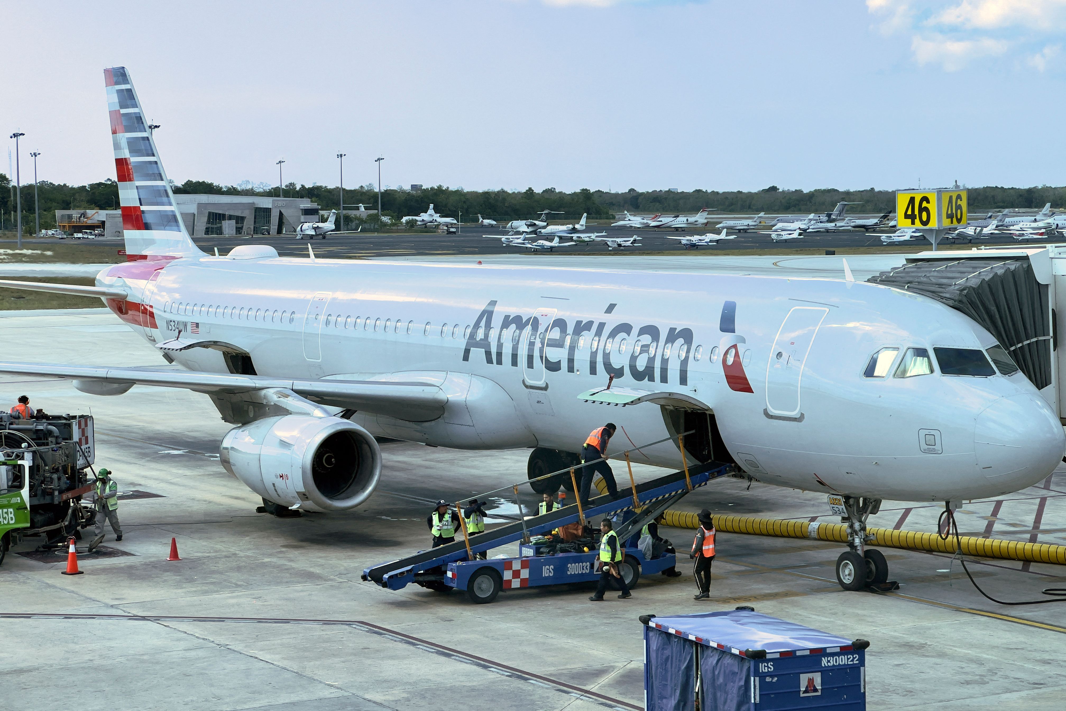 American Airlines passenger complains about uncomfortable seat recliner mishap on flight