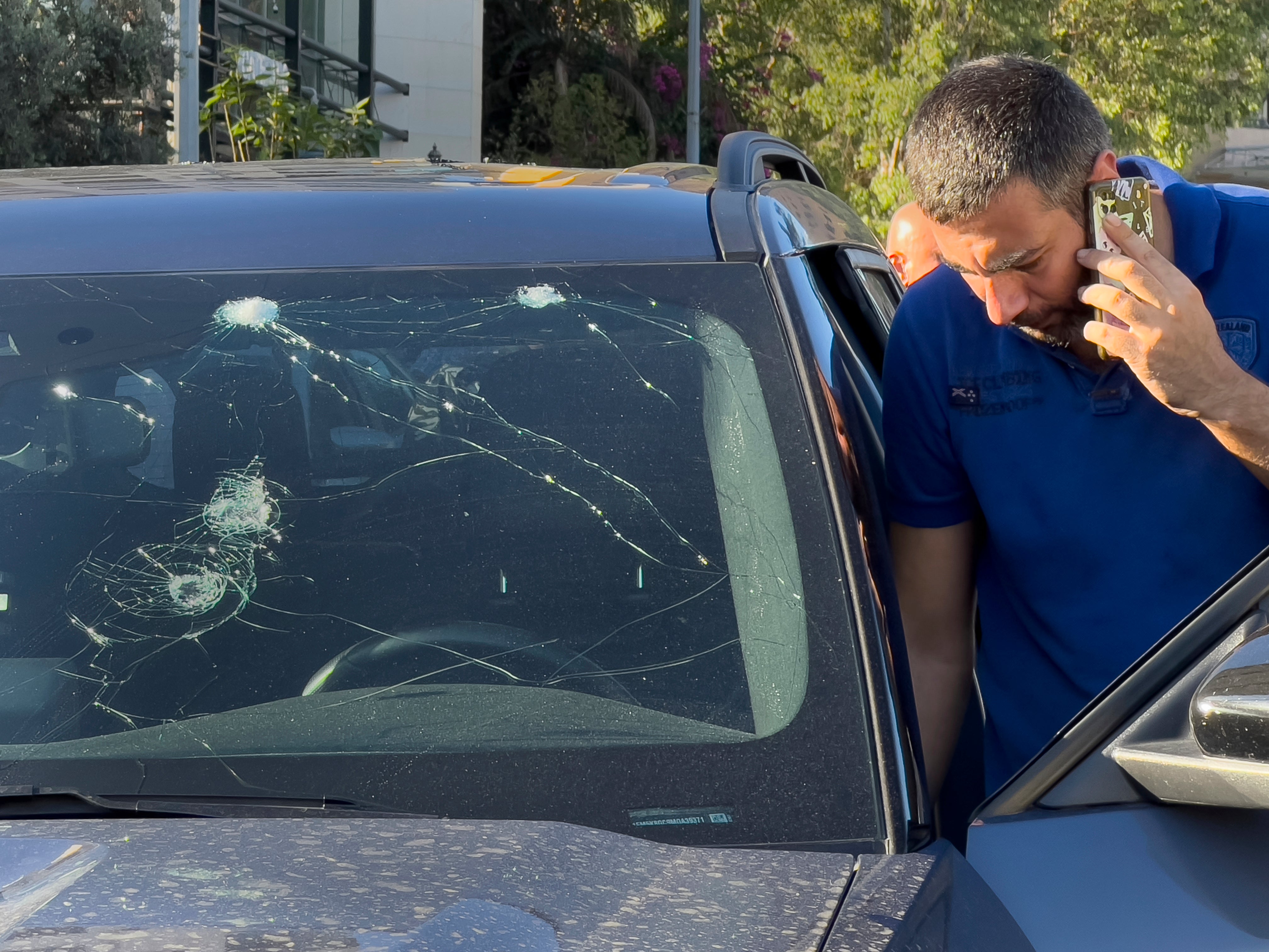 A police officer inspects a car in which a hand-held pager exploded, in Beirut, Lebanon, Tuesday, 17 Sept 2024