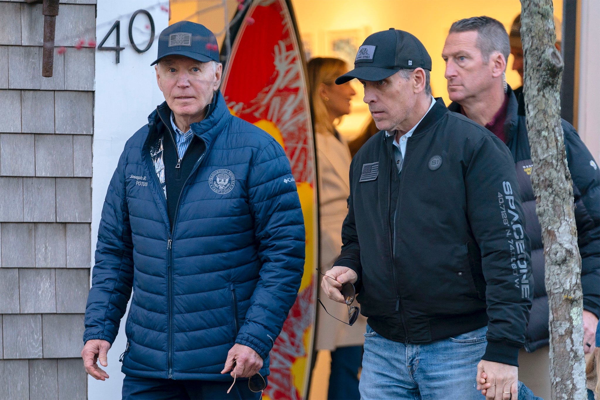 President Joe Biden and son Hunter Biden walk in downtown Nantucket Mass., Friday, Nov. 29, 2024.