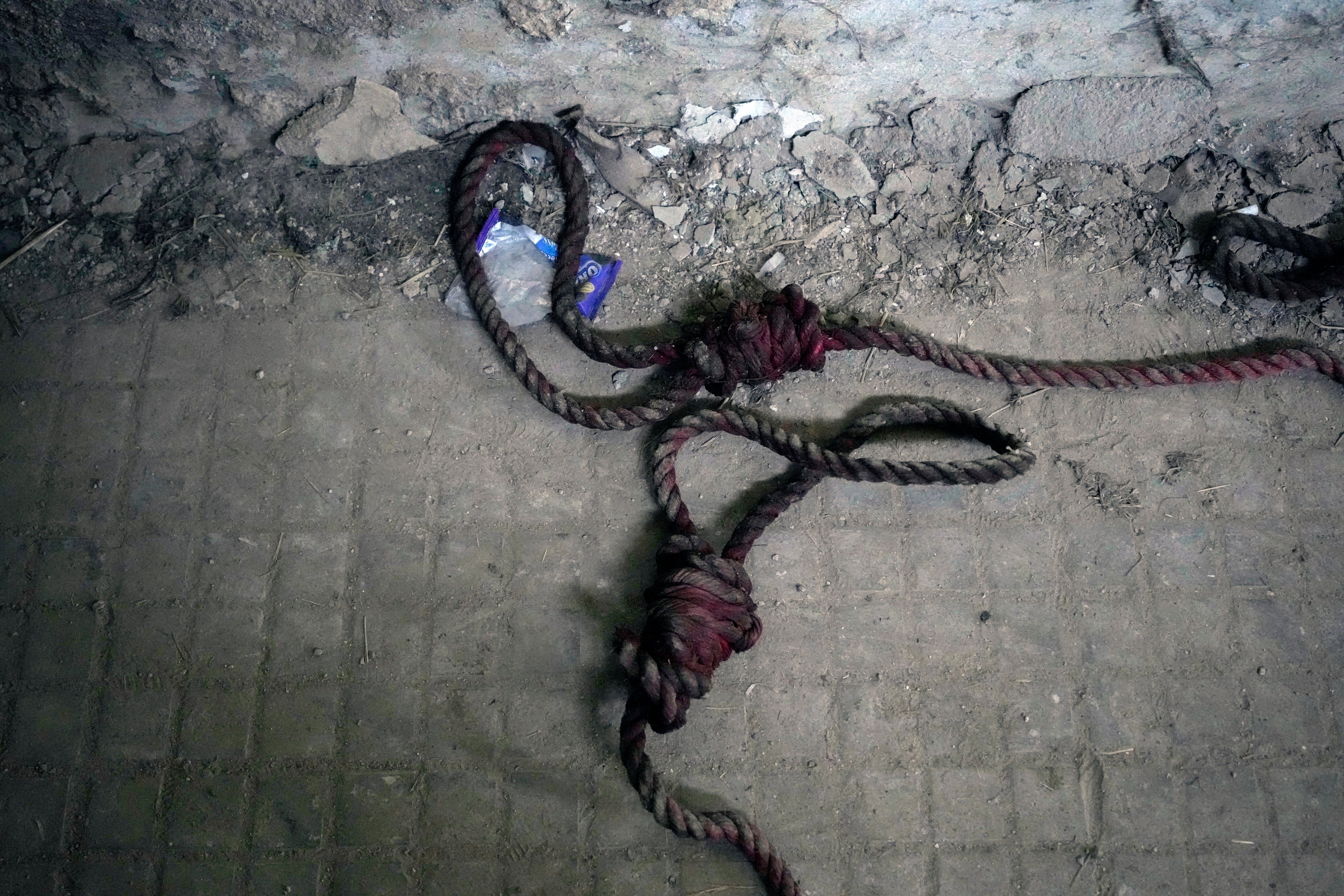 A blood-stained rope lies on the floor in the infamous Saydnaya military prison, just north of Damascus, Syria, early this week. Crowds gathered to enter the prison, known as the 