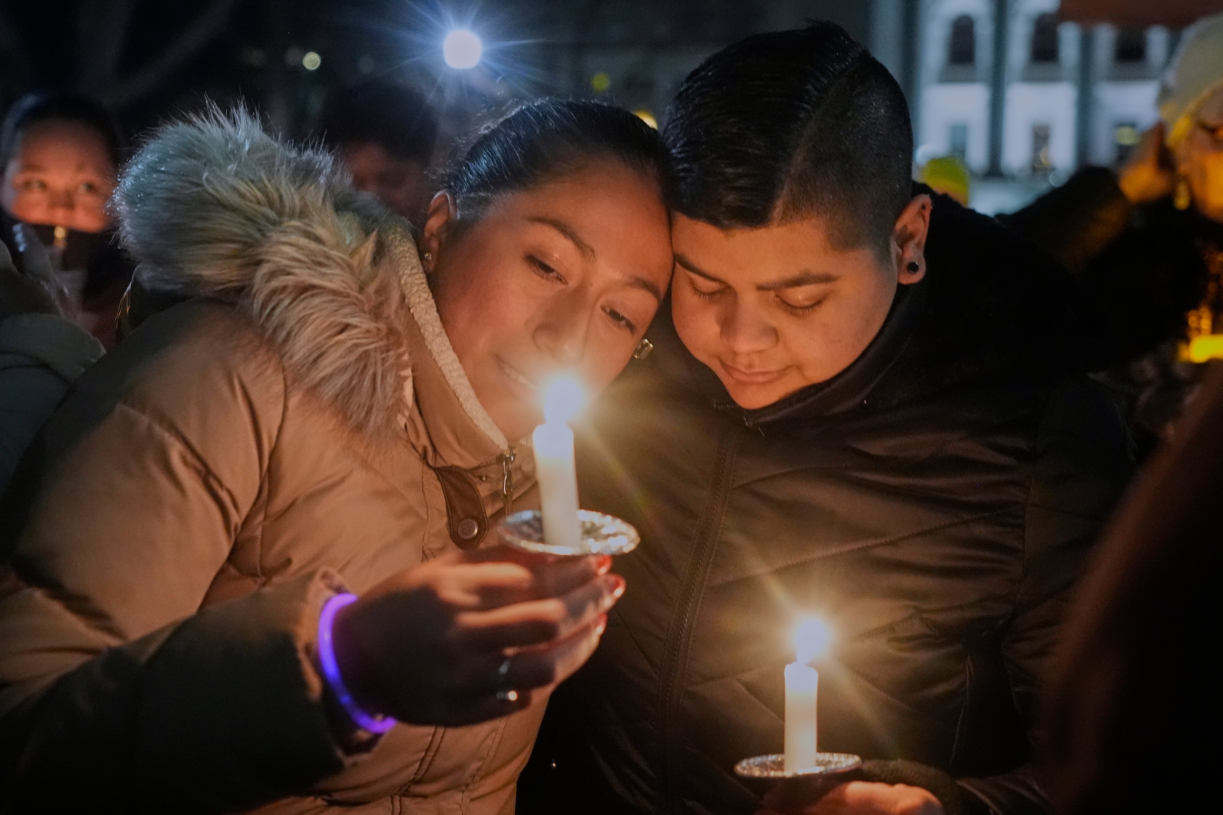 Residents flocked to Tuesday’s vigil following a shooting at the Abundant Life Christian School on Monday