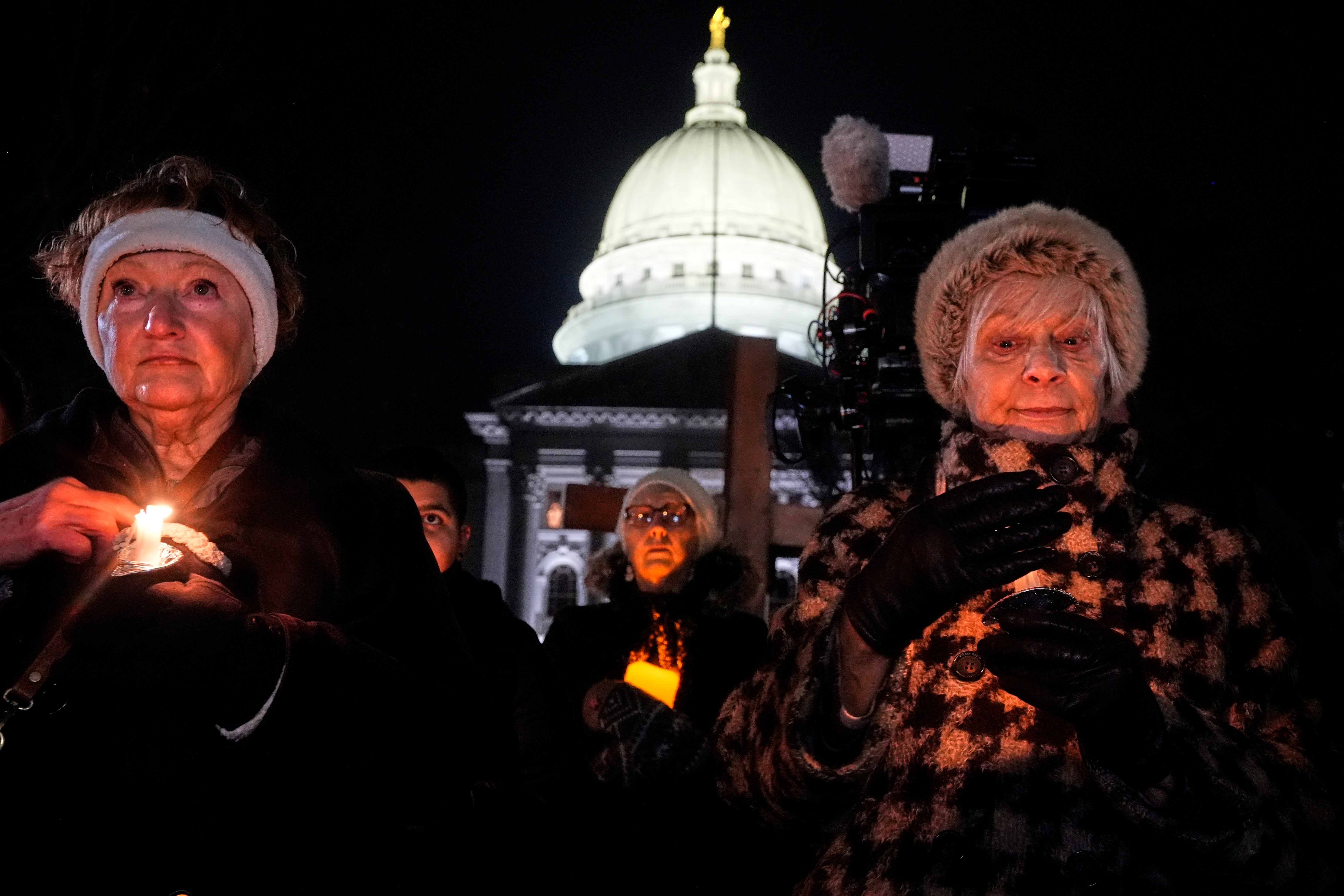 Candles were lit in memory of those who lost their lives in the shooting