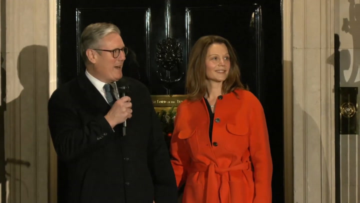 Prime minister Keir Starmer switches on Christmas lights outside 10 Downing Street