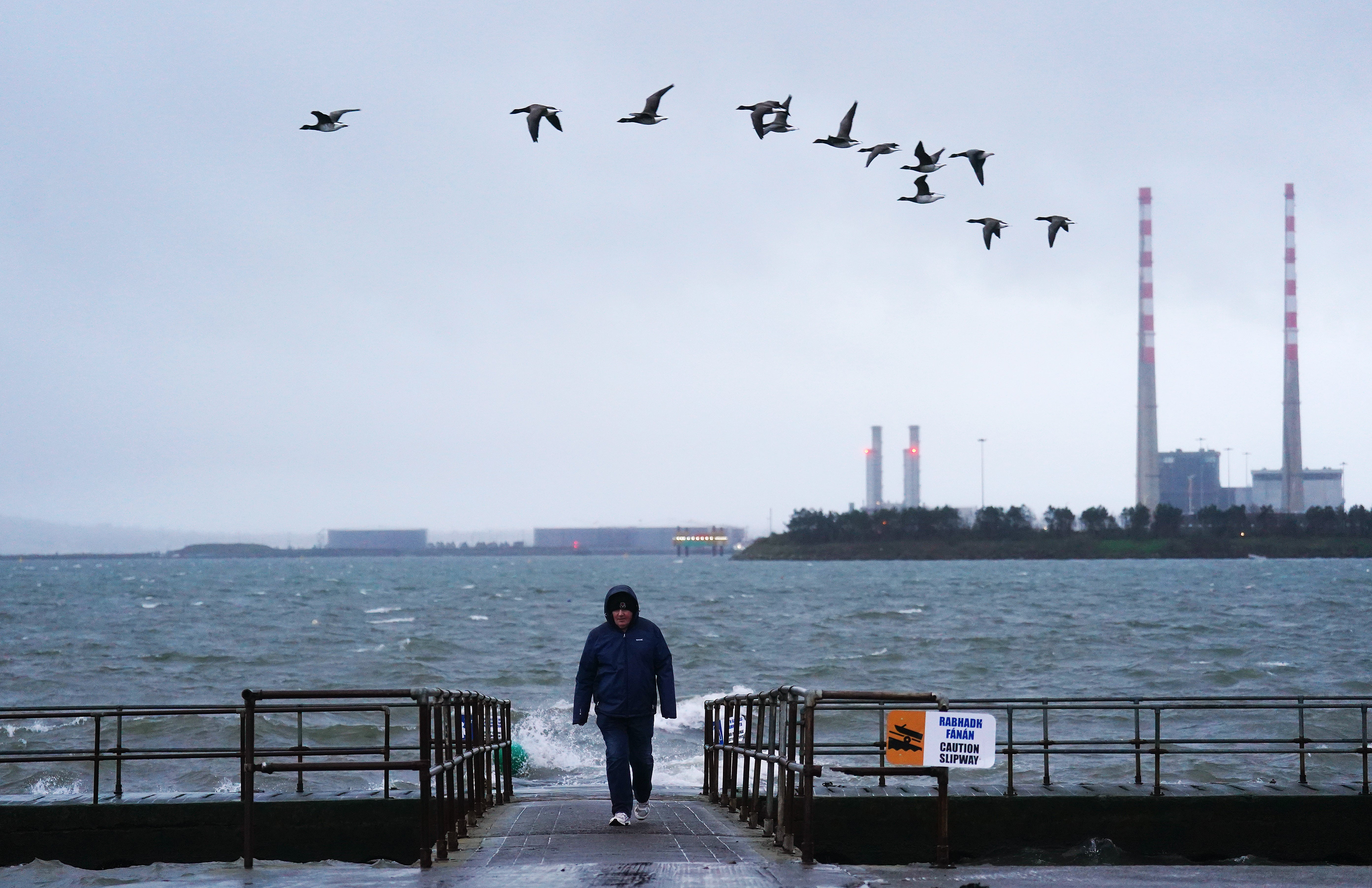 A person on a slipway in Clontarf, Dublin