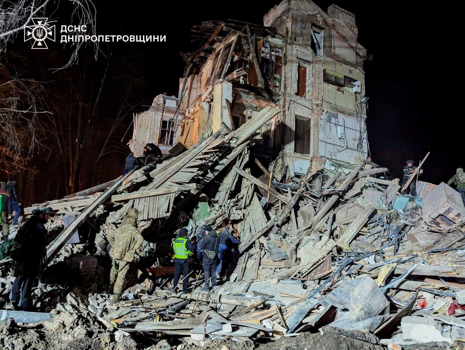 Rescuers work at a site of a residential building heavily damaged during a Russian missile attack, amid Russia’s attack on Ukraine, in Kryvyi Rih, Ukraine 24 December 2024