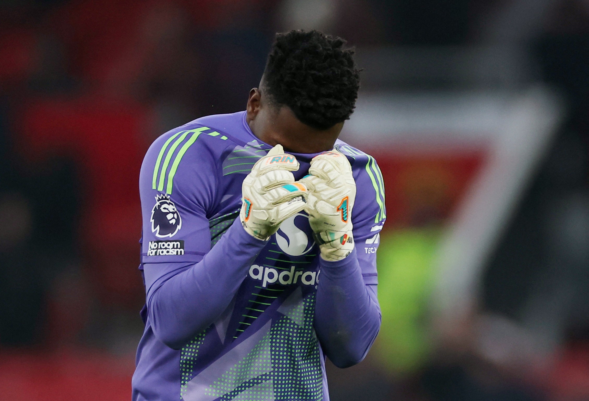 Manchester United's Andre Onana reacts after his latest blunder