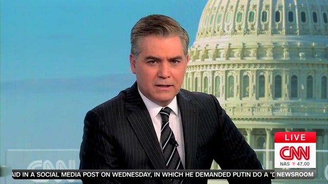 CNN anchor Jim Acosta said he was “still reporting from Washington” on Thursday while his future at the network remains in doubt.