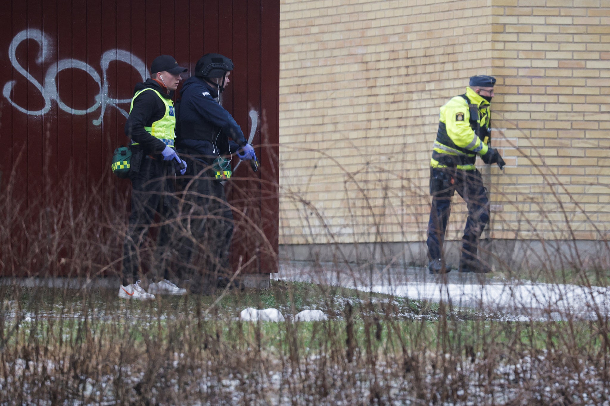 Armed police descend on a school in Örebro, Sweden, after a gunman opened fire on the campus