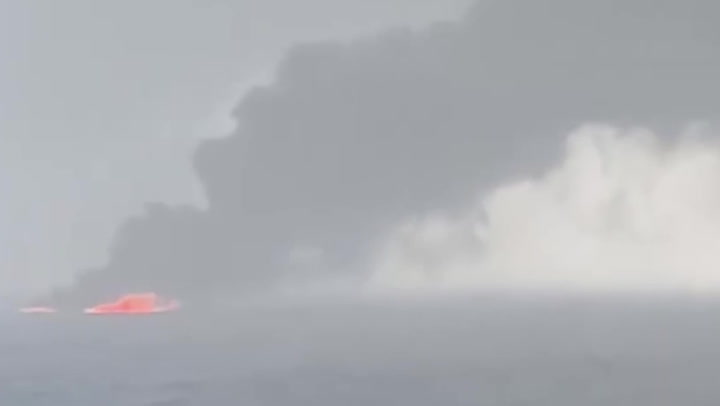 Video: Smoke billows from oil tanker and cargo ship collision in North Sea