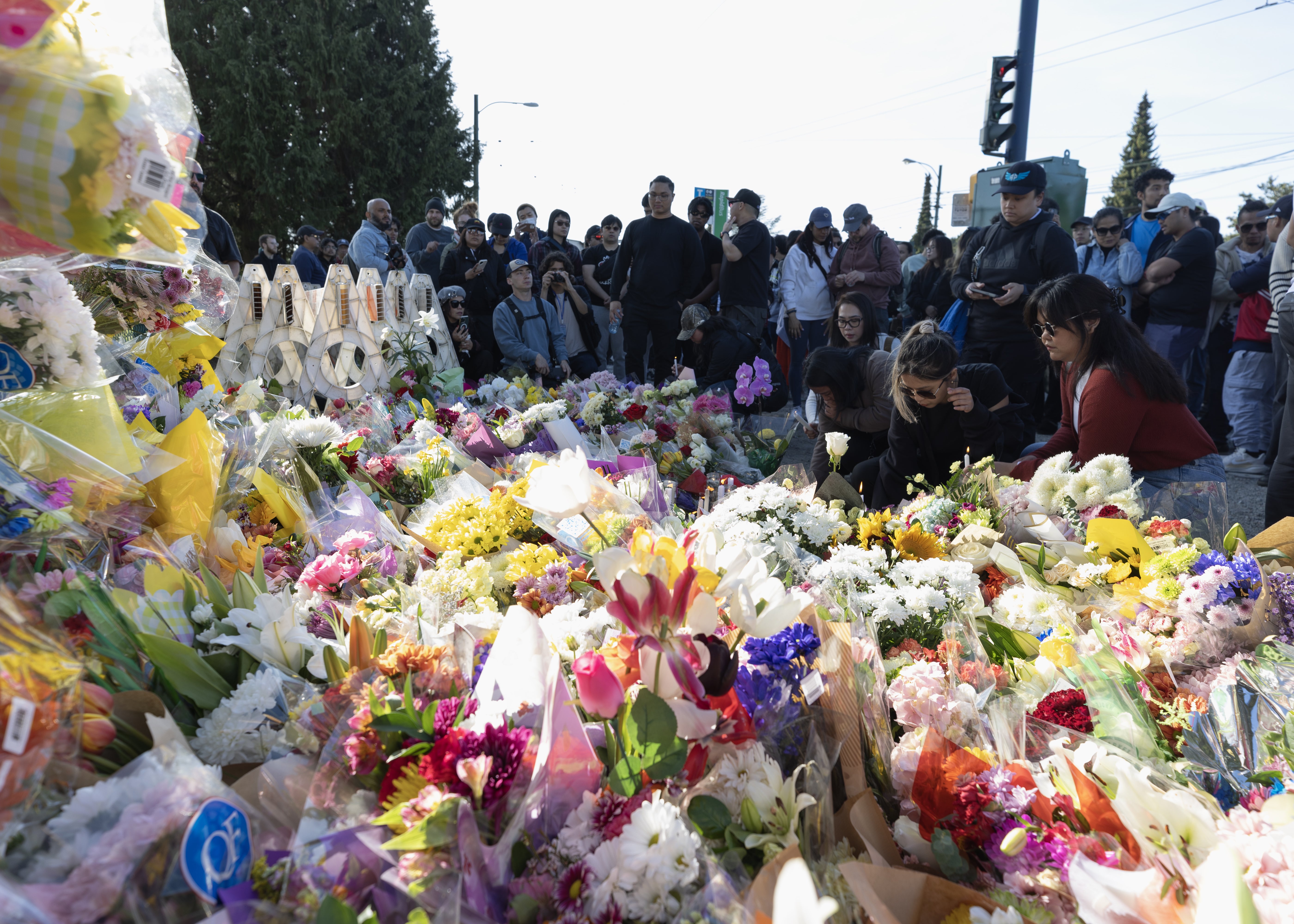 The makeshift memorial near the scene where a car drove into a crowd at the Lapu Lapu Festival on 27 April